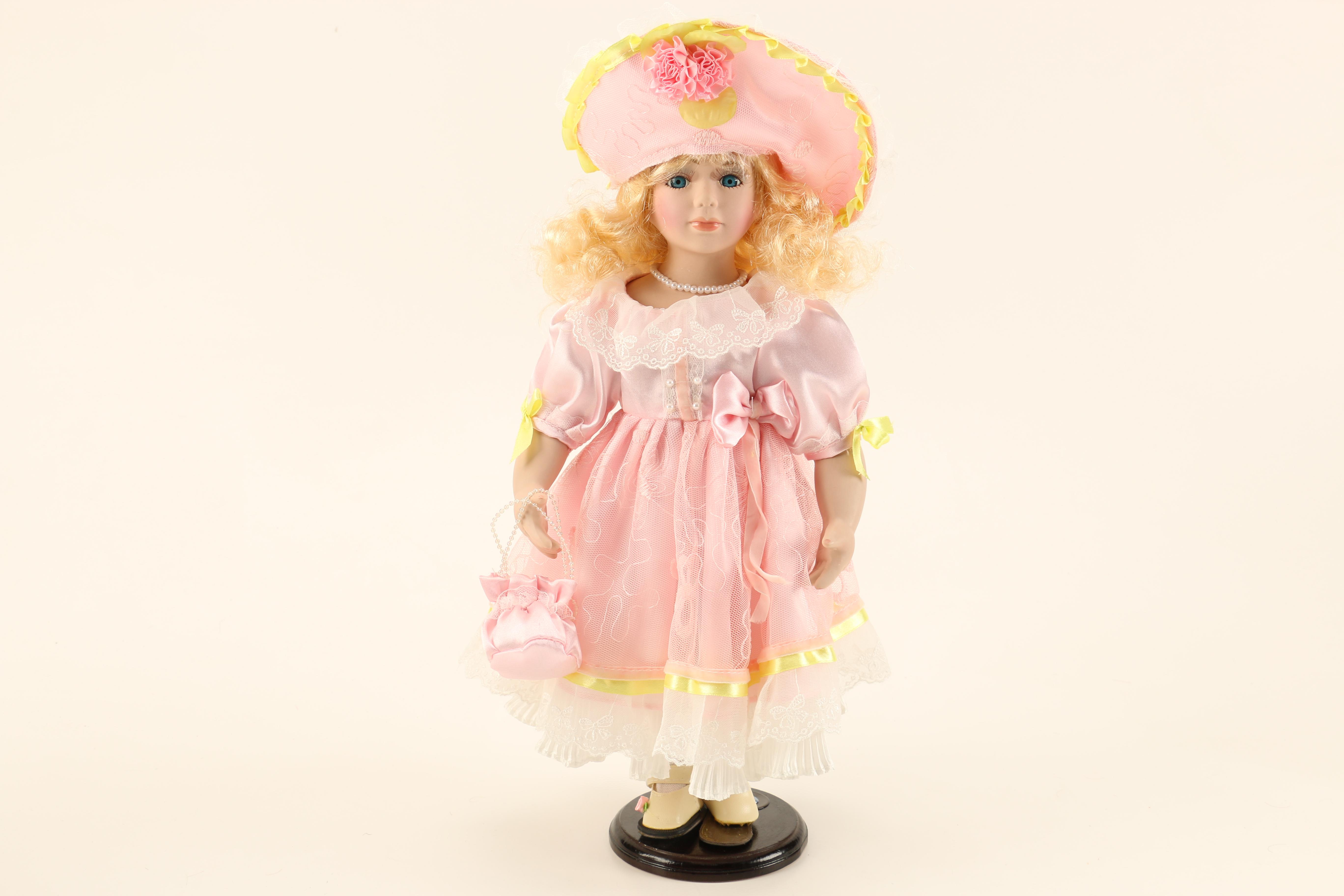 Collection of Four Porcelain Dolls