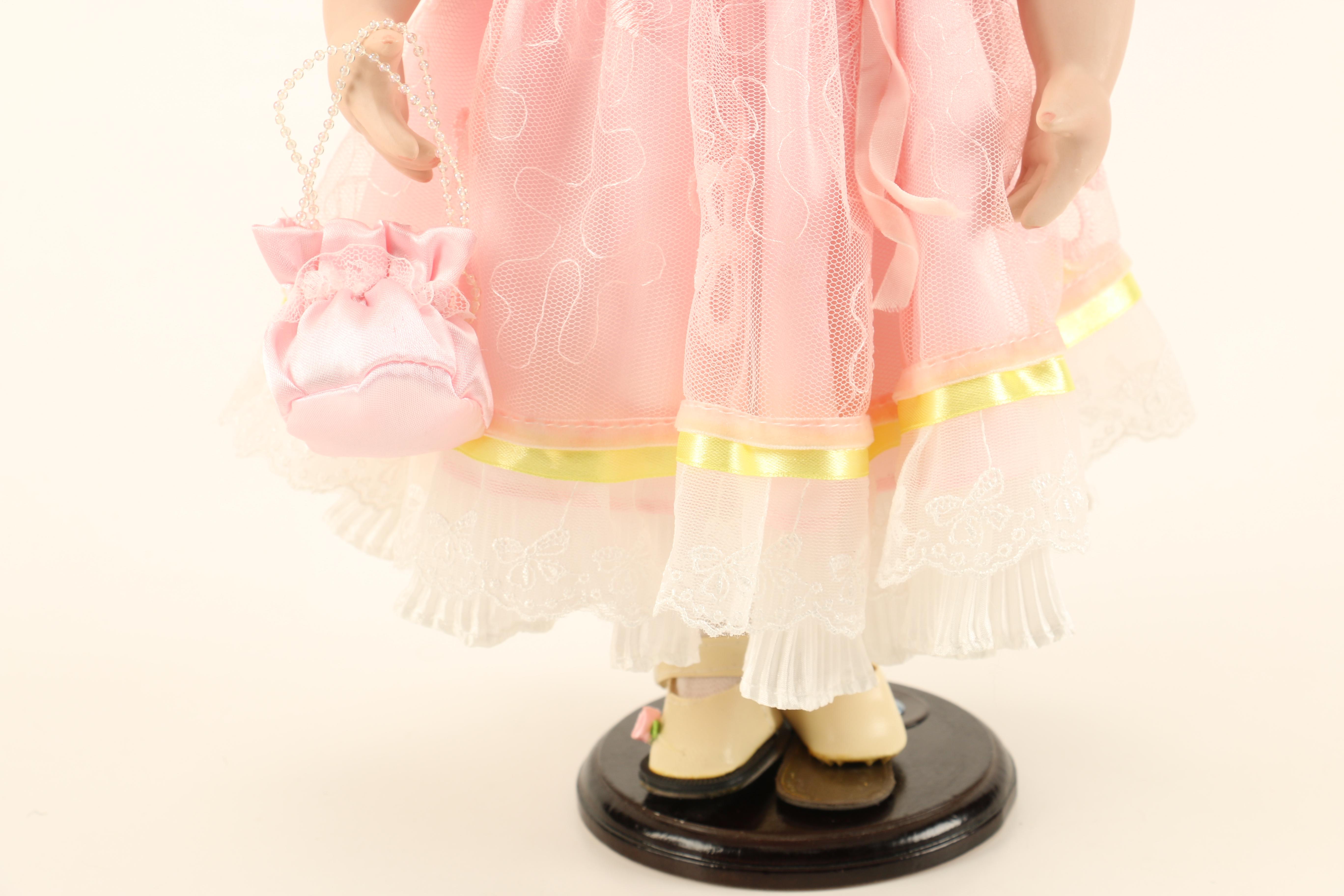 Collection of Four Porcelain Dolls