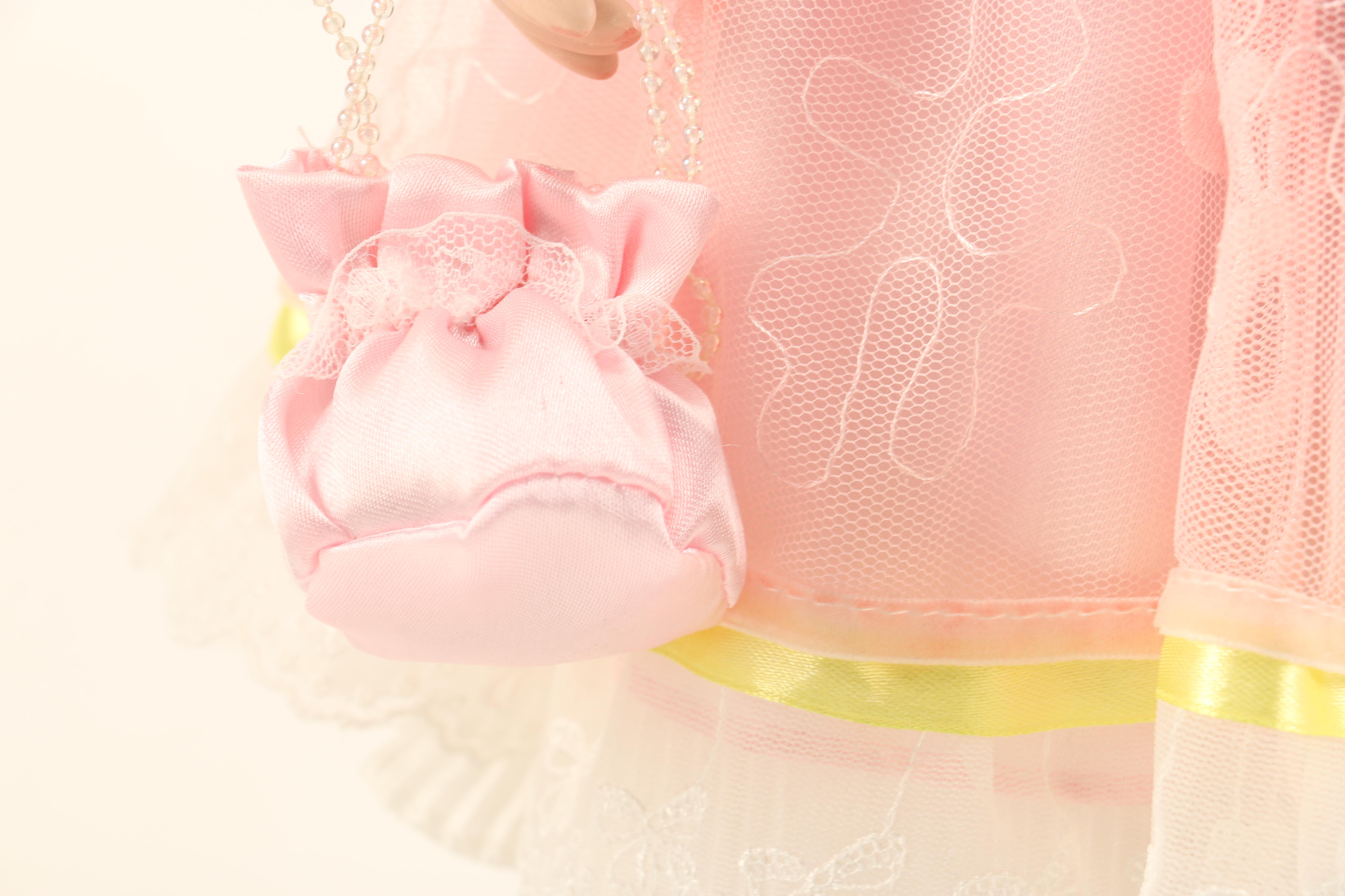 Collection of Four Porcelain Dolls