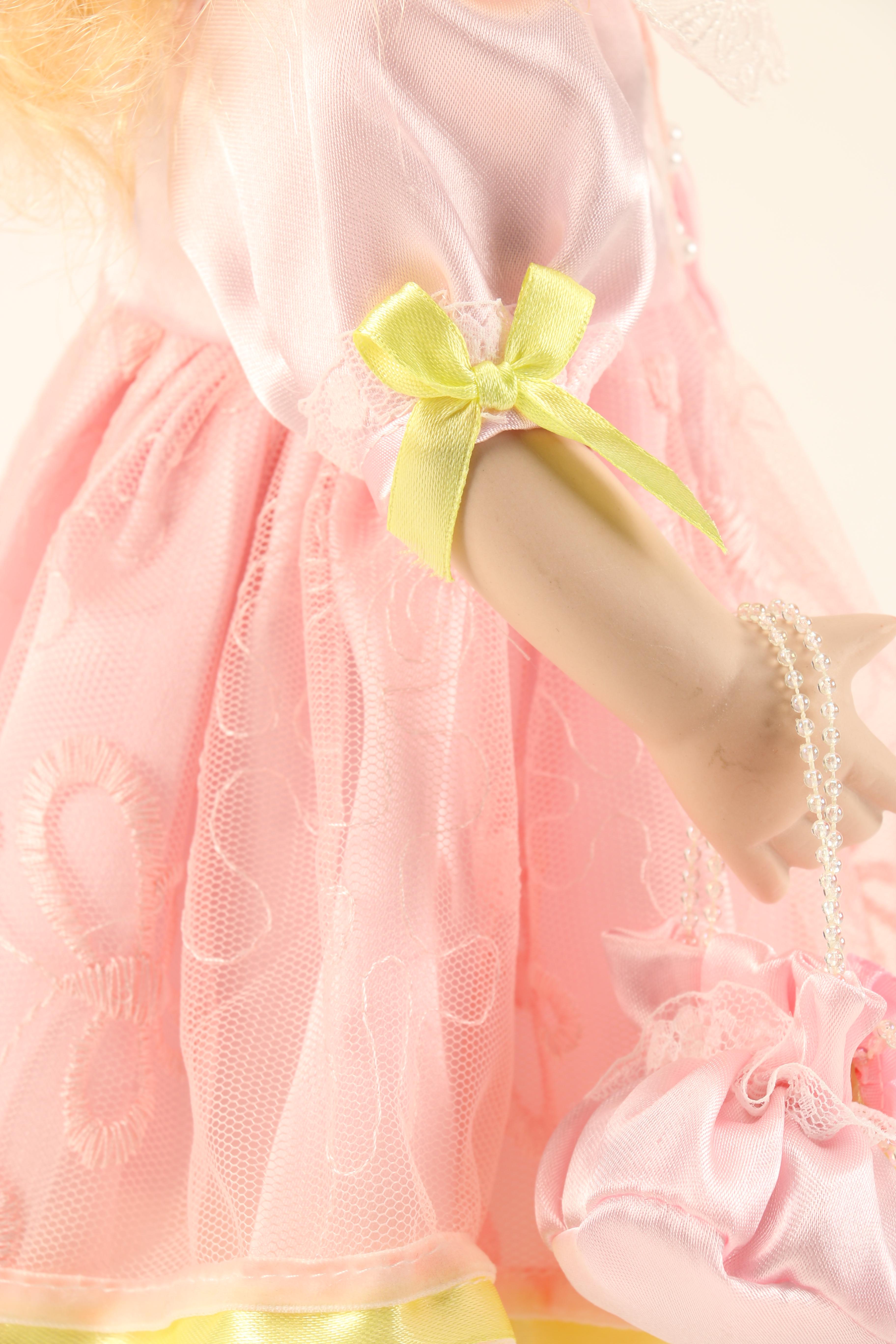 Collection of Four Porcelain Dolls