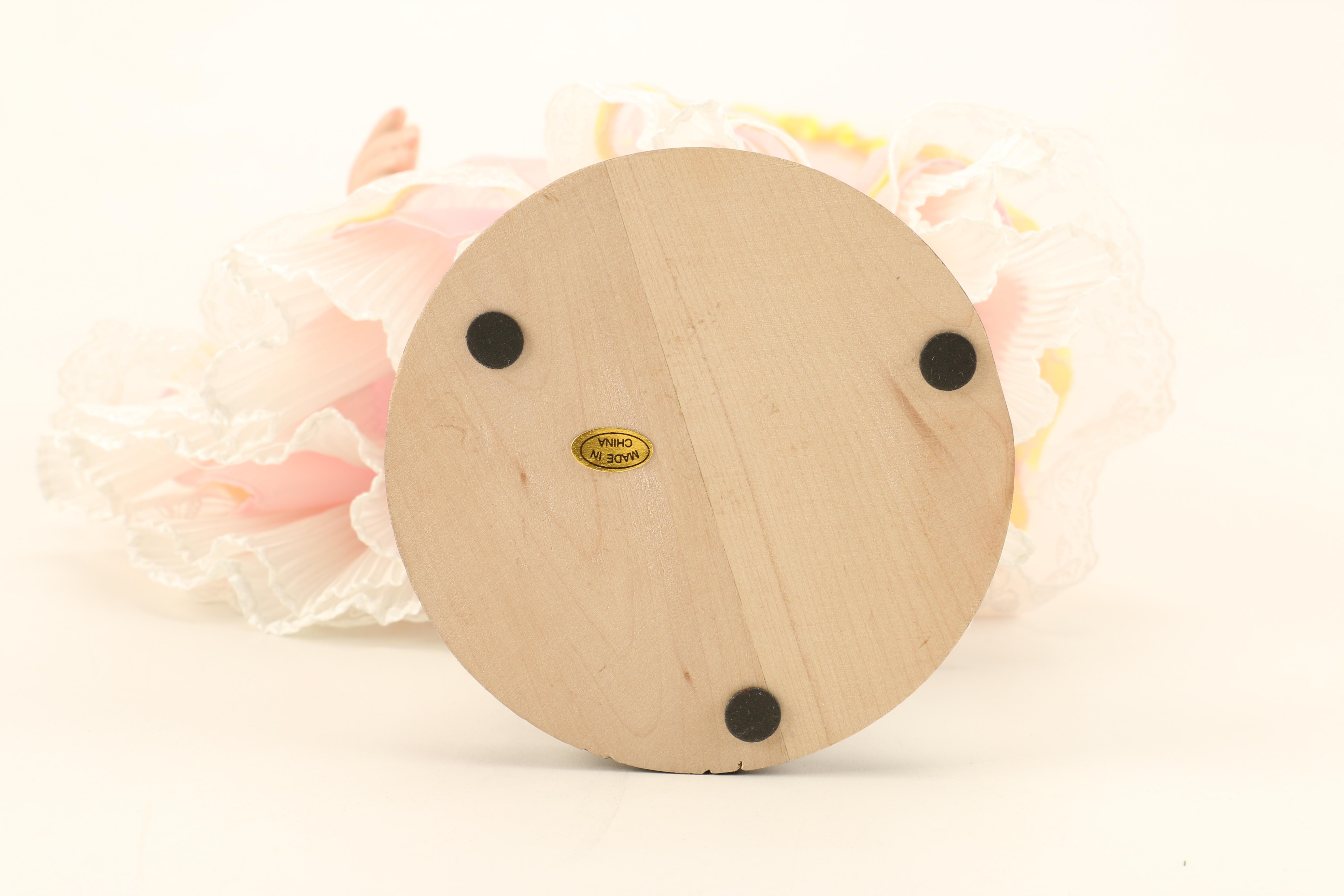 Collection of Four Porcelain Dolls