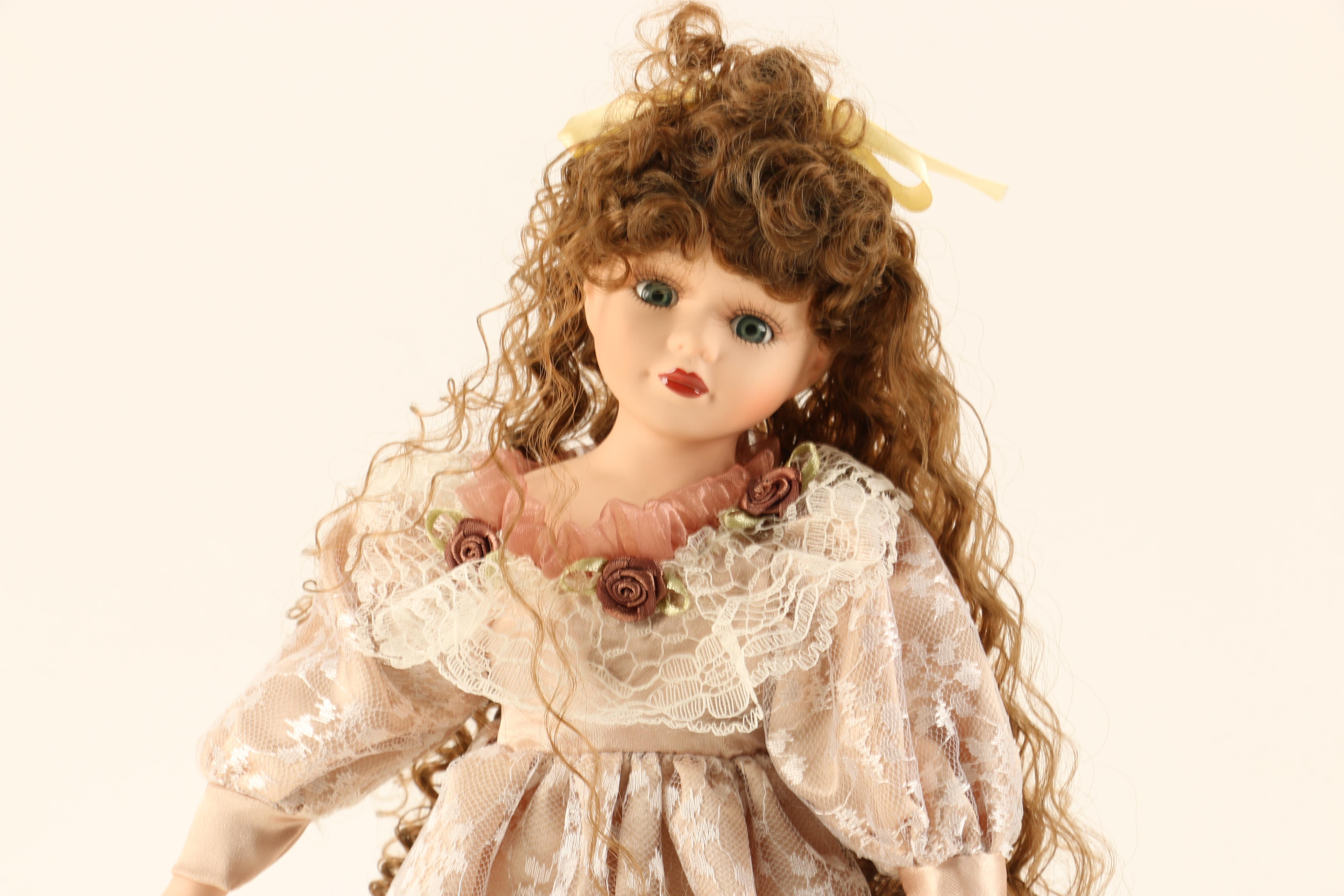 Collection of Four Porcelain Dolls