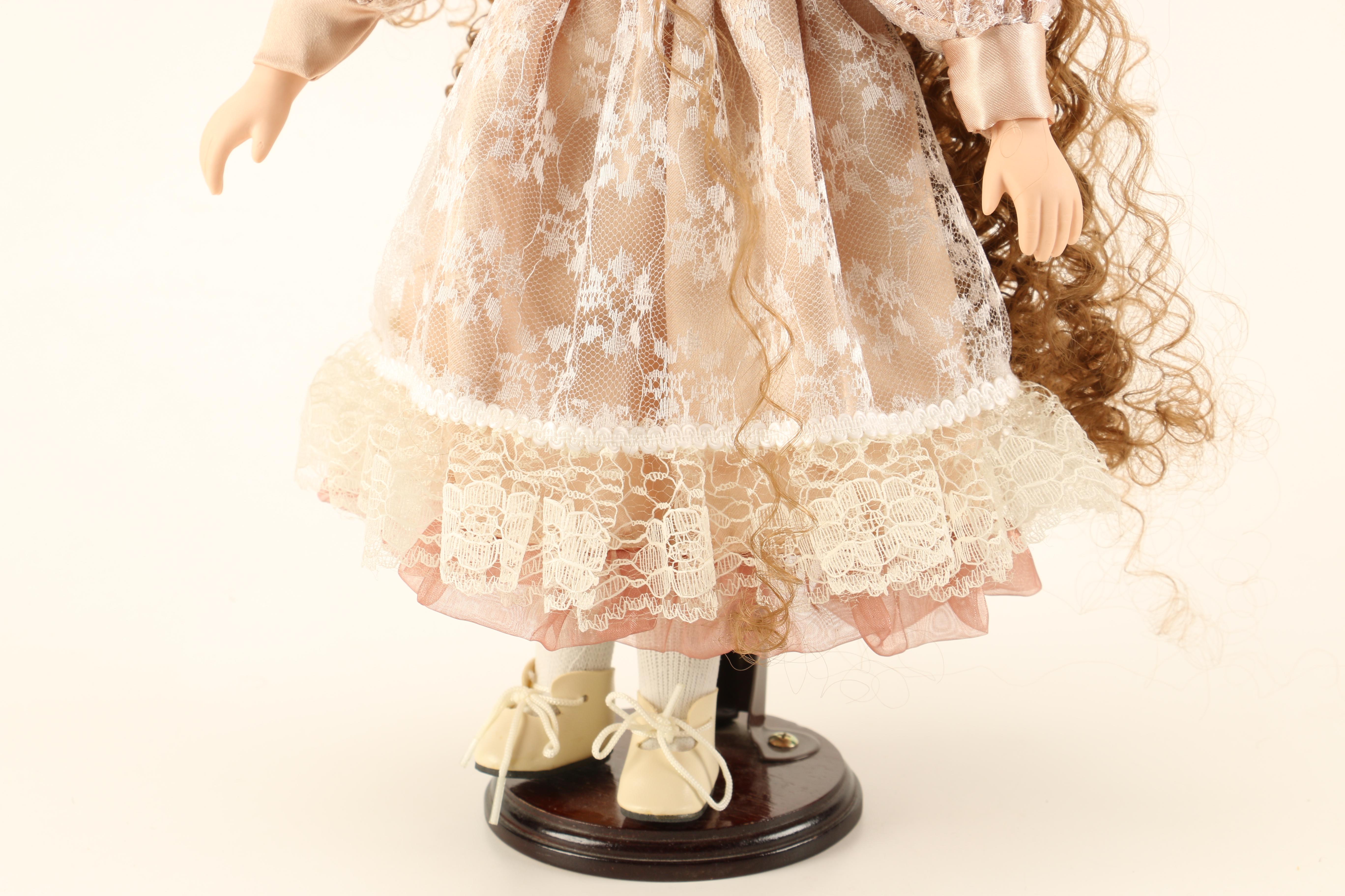 Collection of Four Porcelain Dolls