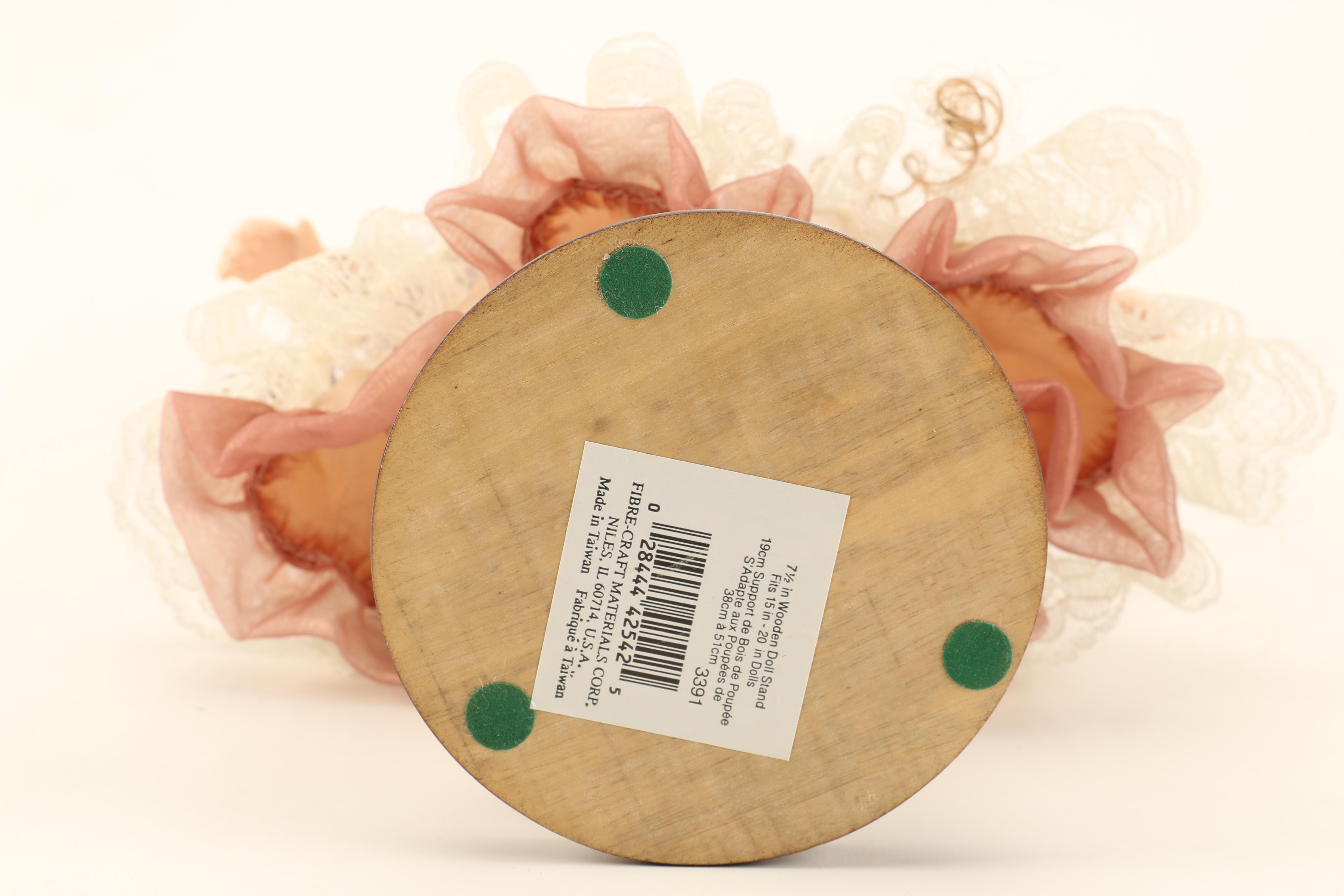 Collection of Four Porcelain Dolls