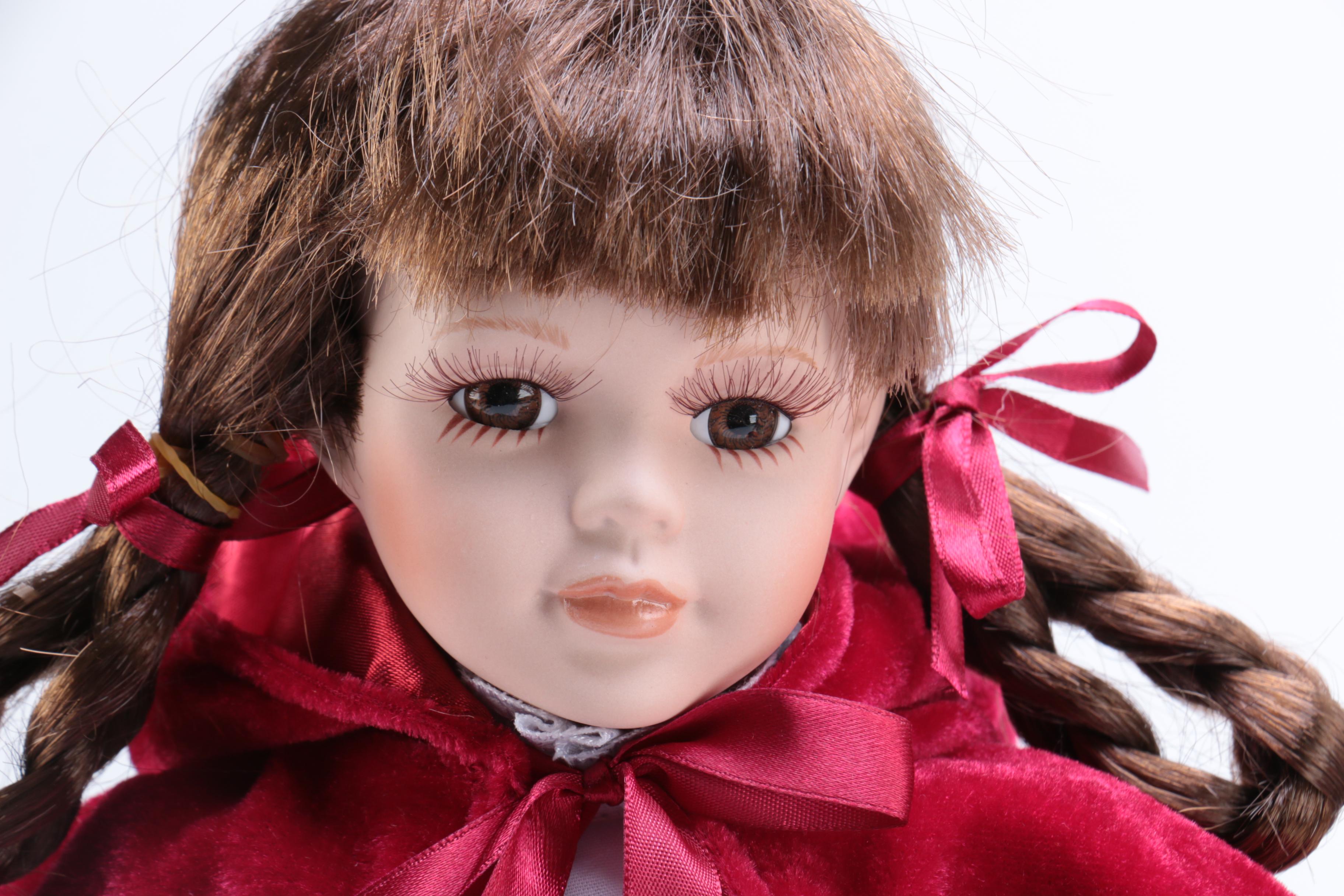 Five Porcelain Dolls Including Little Red Riding Hood