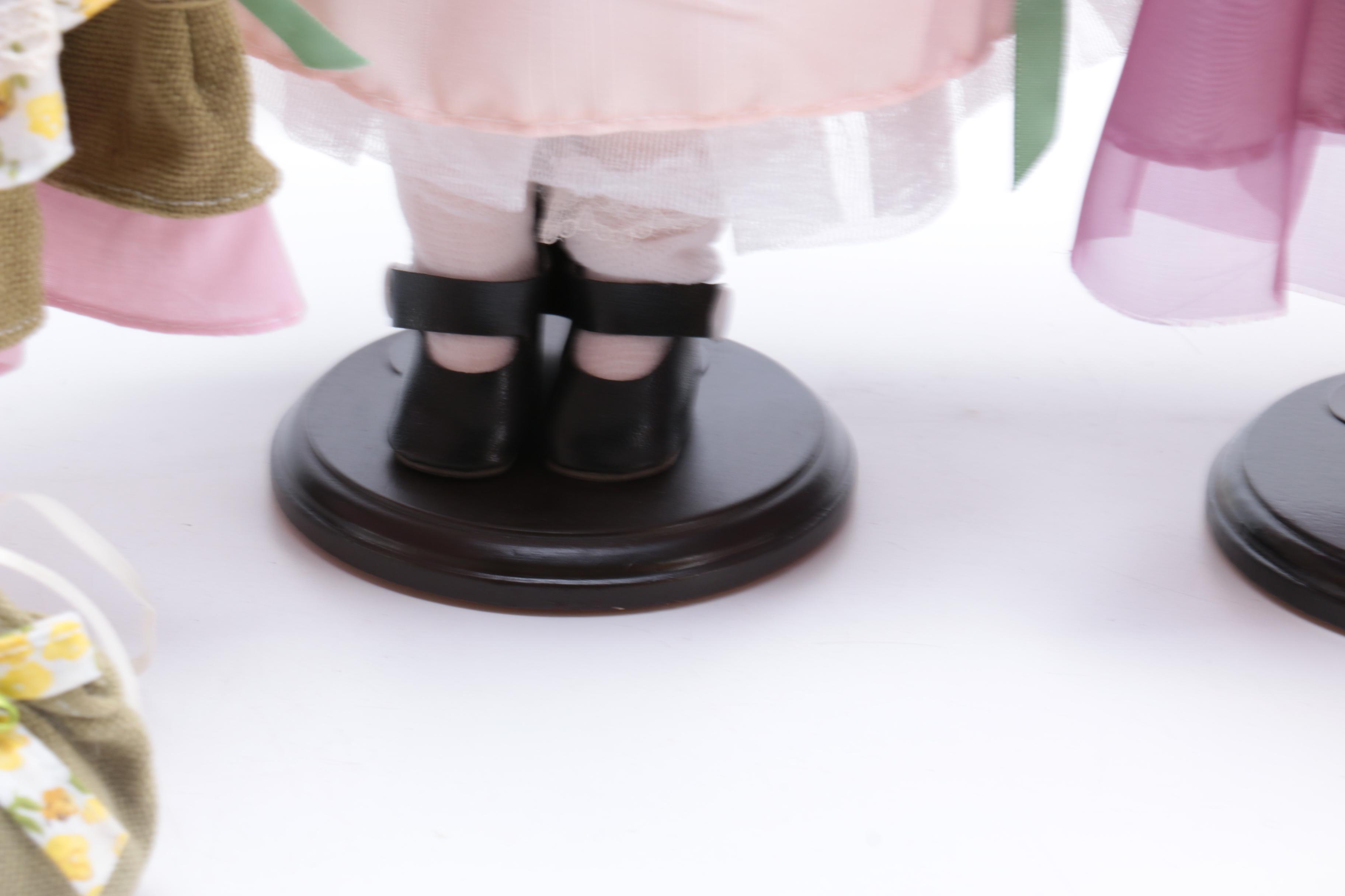 Five Porcelain Dolls Including Little Red Riding Hood