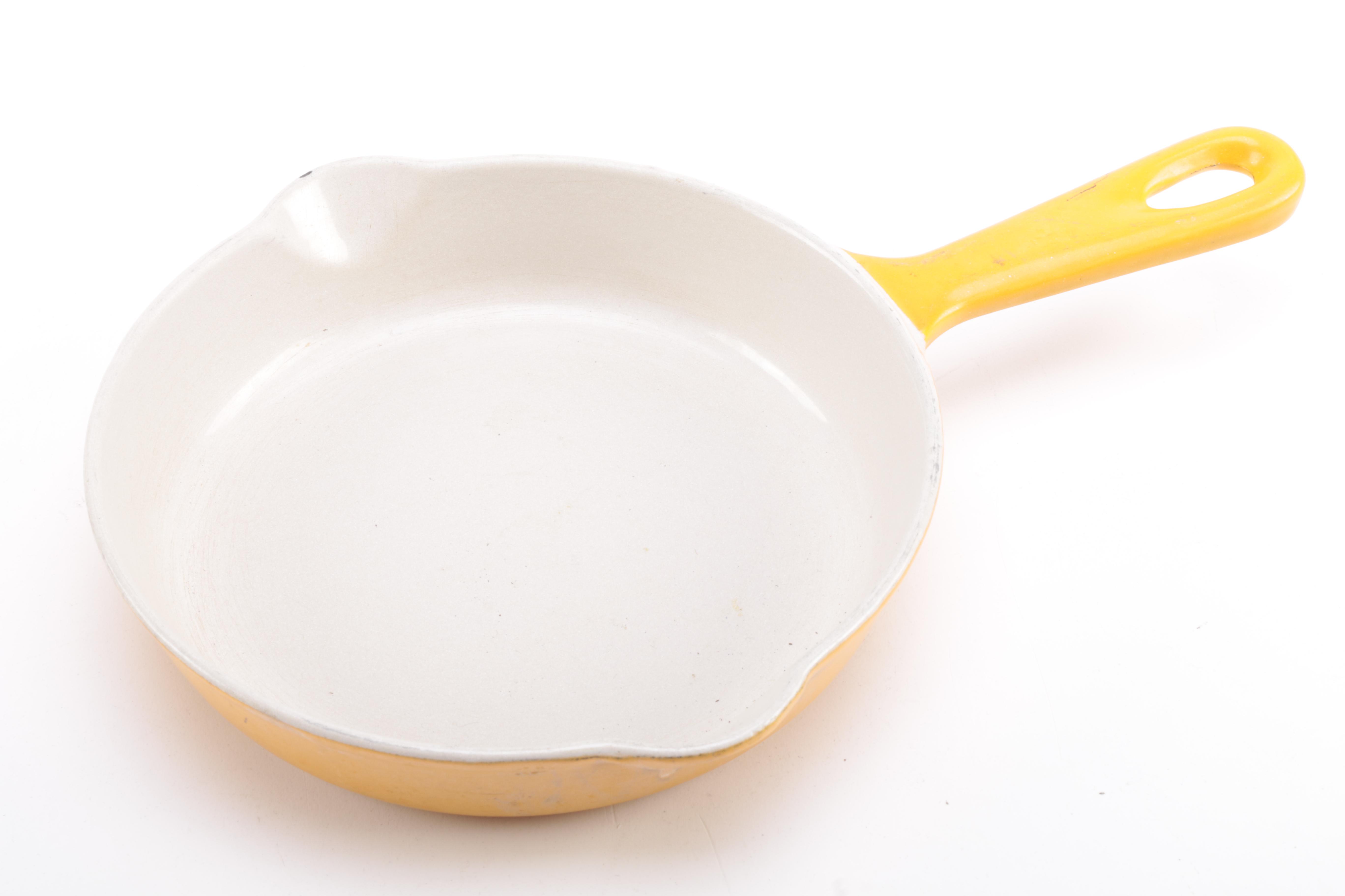 Assorted Enameled Cast Iron Cookware featuring Le Creuset