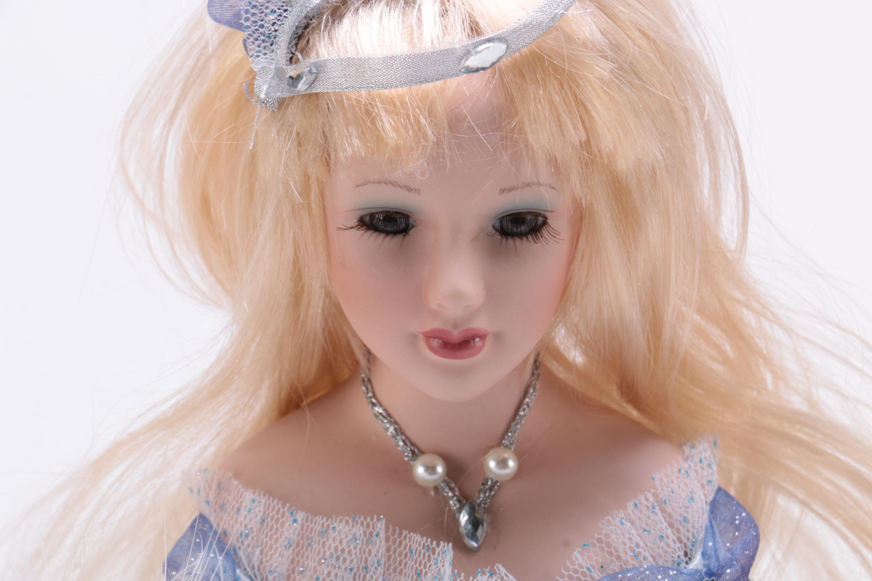 Collection of Three Porcelain Dolls