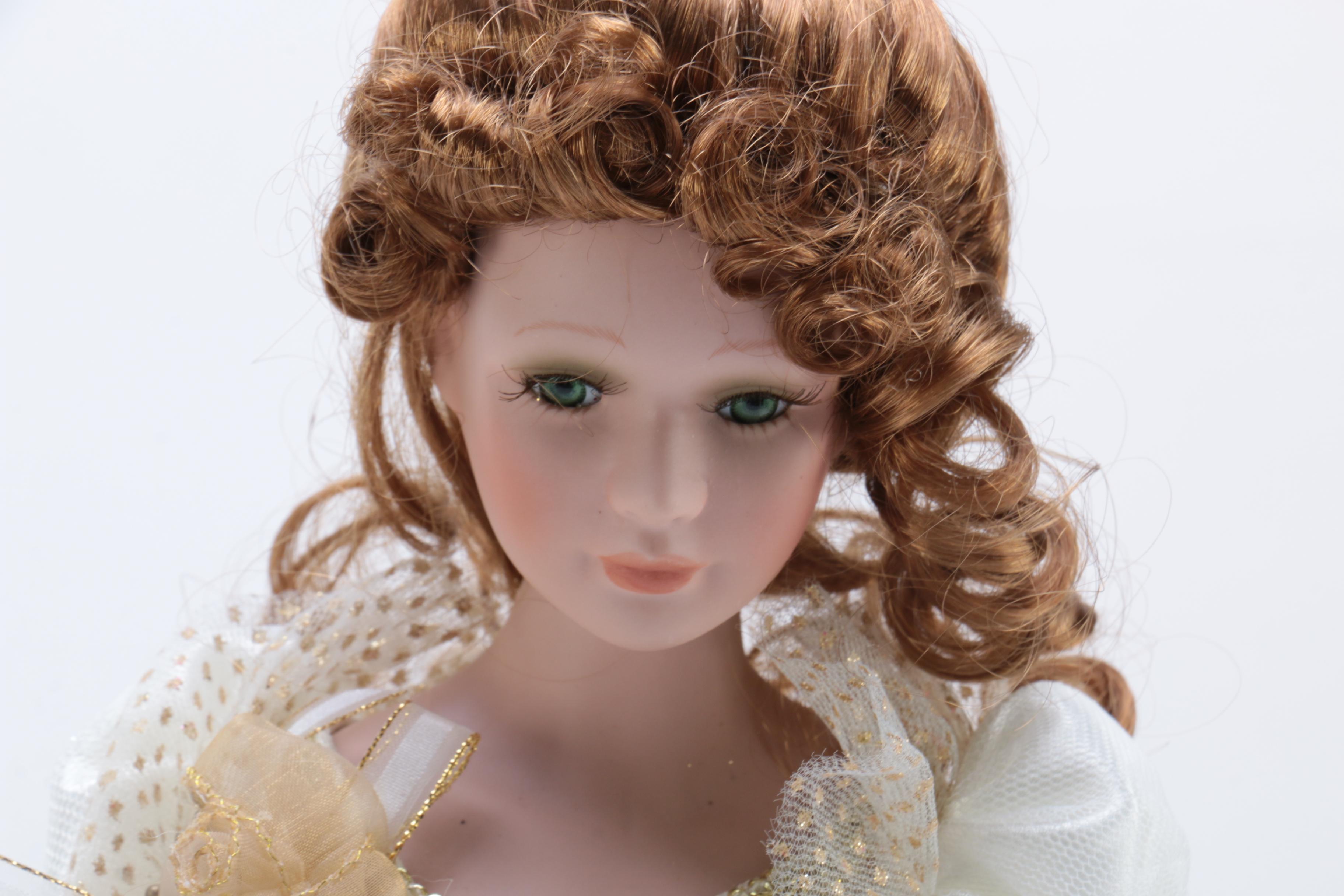 Collection of Three Porcelain Dolls