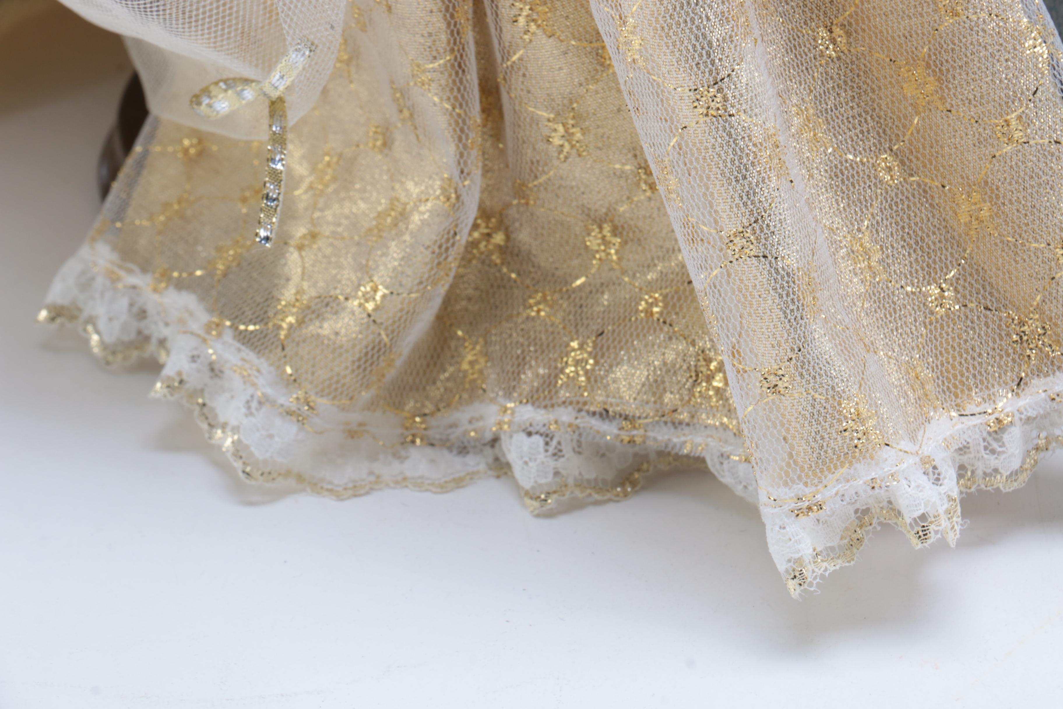 Collection of Three Porcelain Dolls