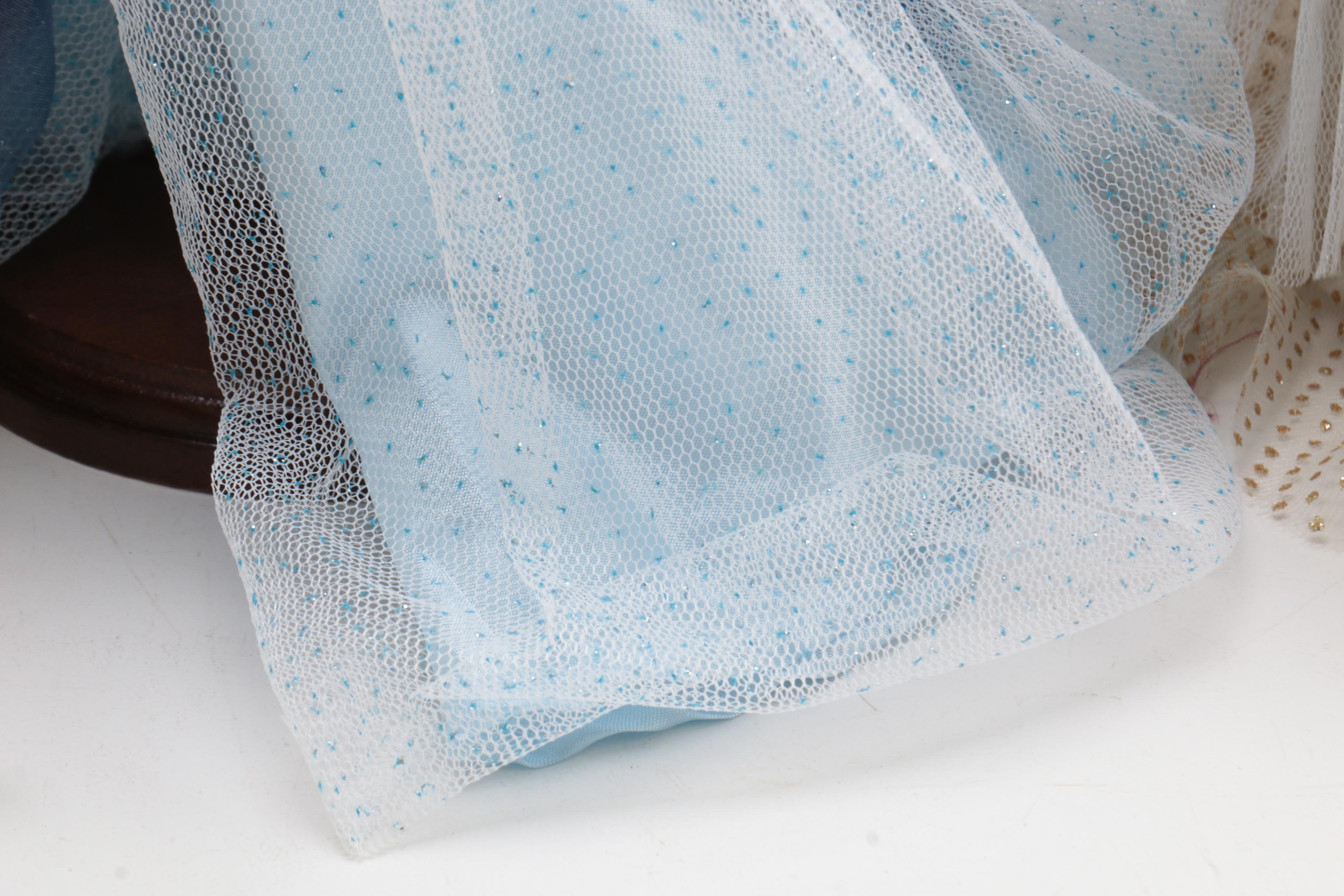 Collection of Three Porcelain Dolls