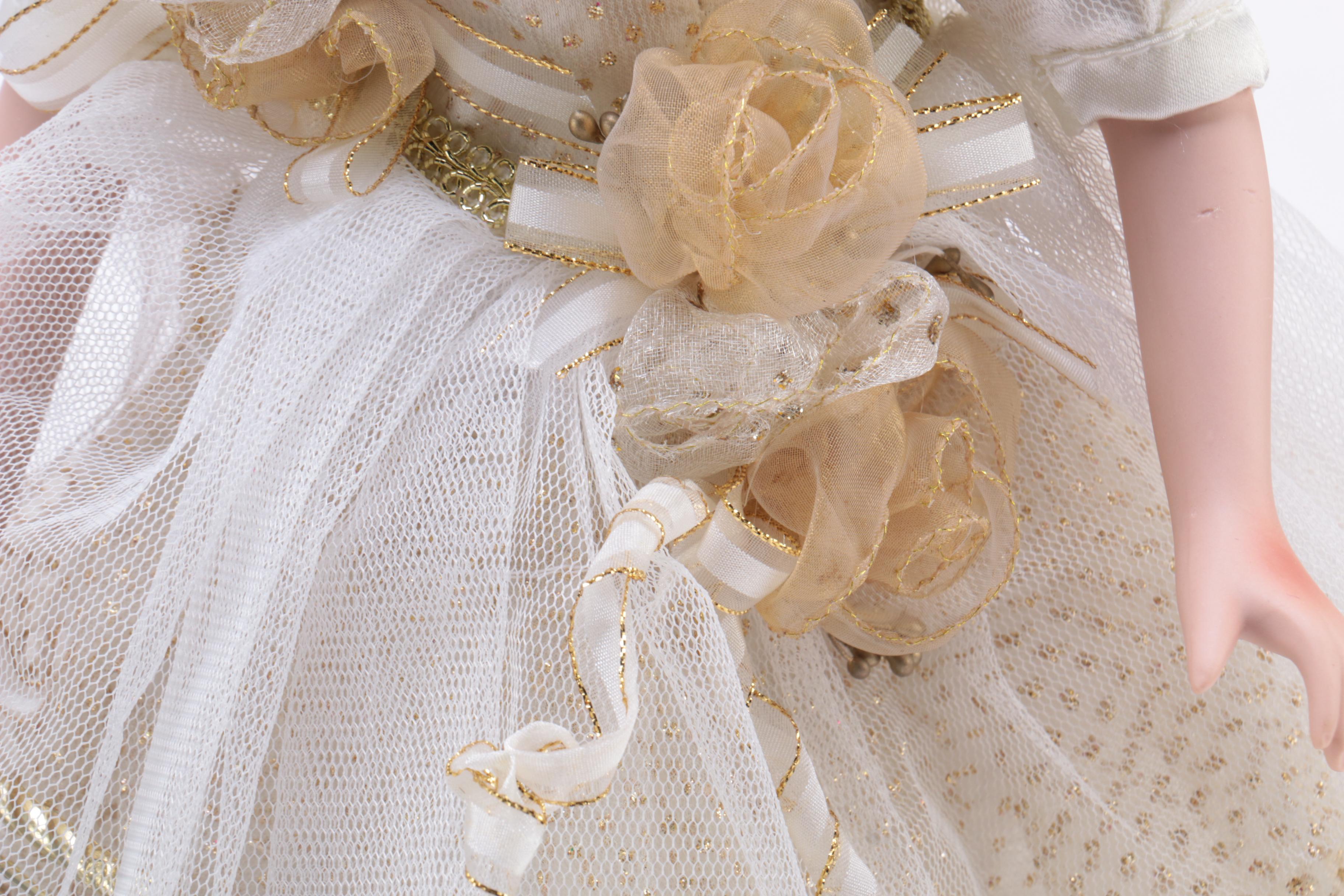 Collection of Three Porcelain Dolls