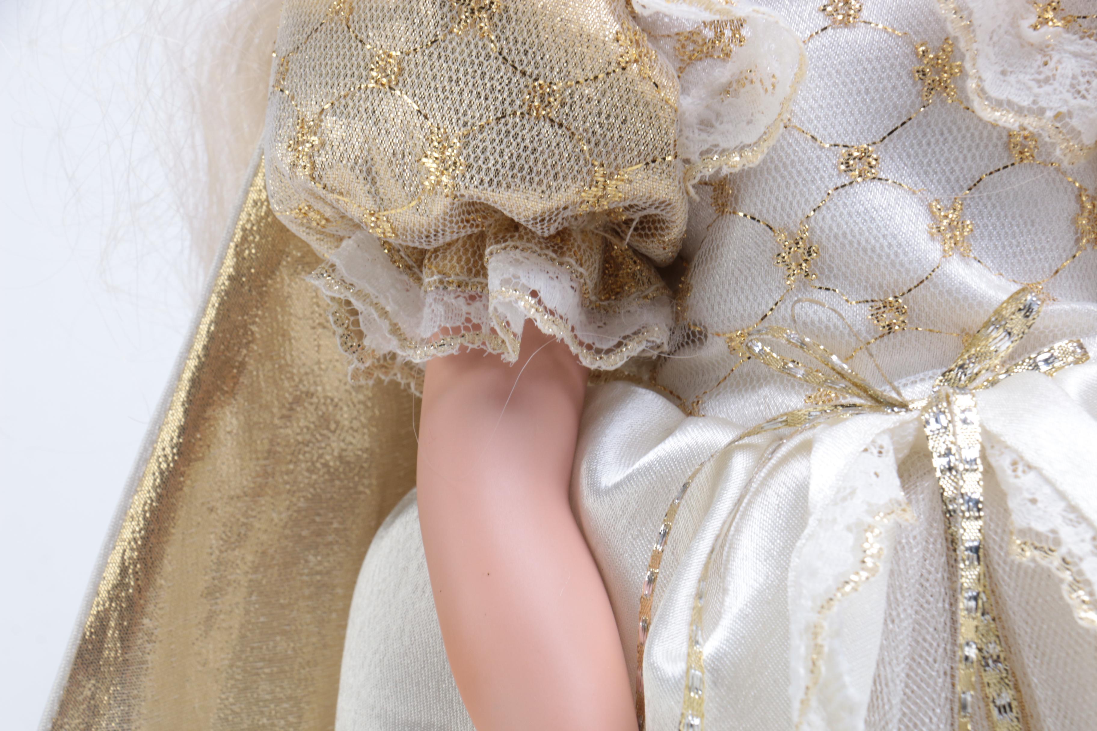 Collection of Three Porcelain Dolls