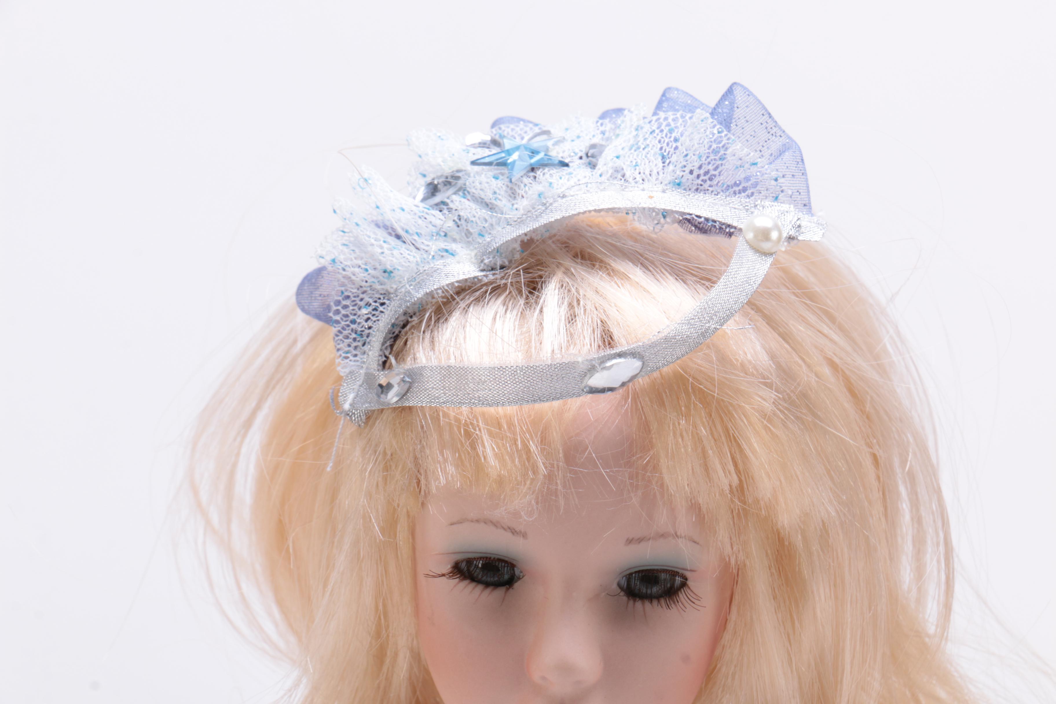 Collection of Three Porcelain Dolls