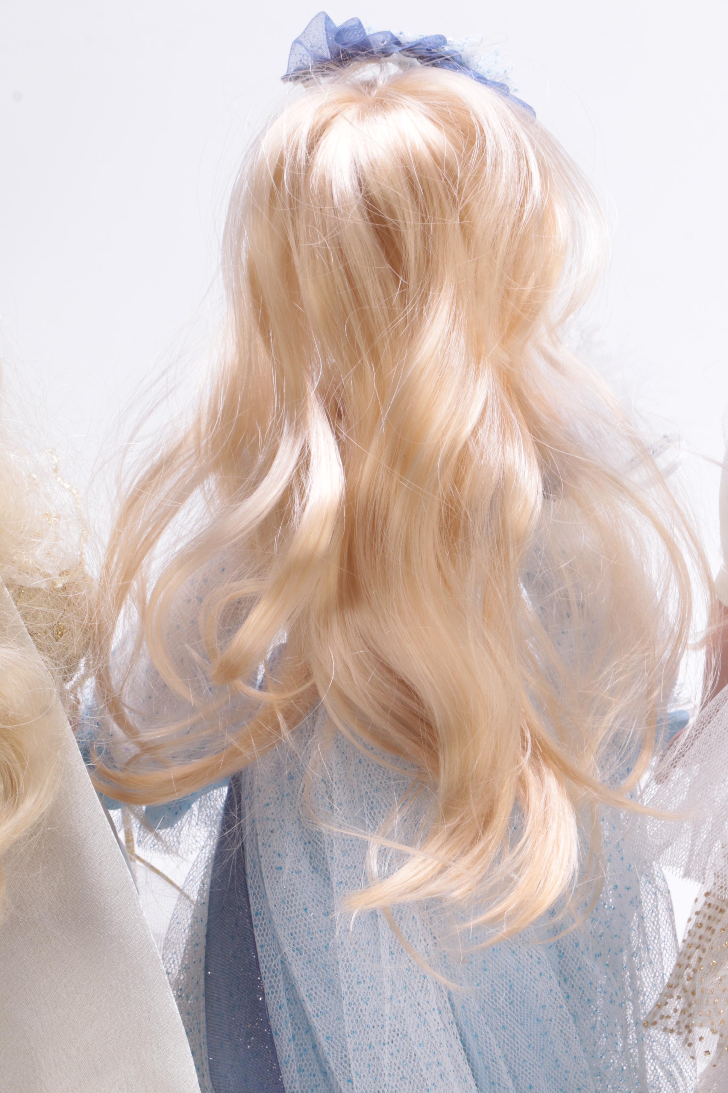 Collection of Three Porcelain Dolls