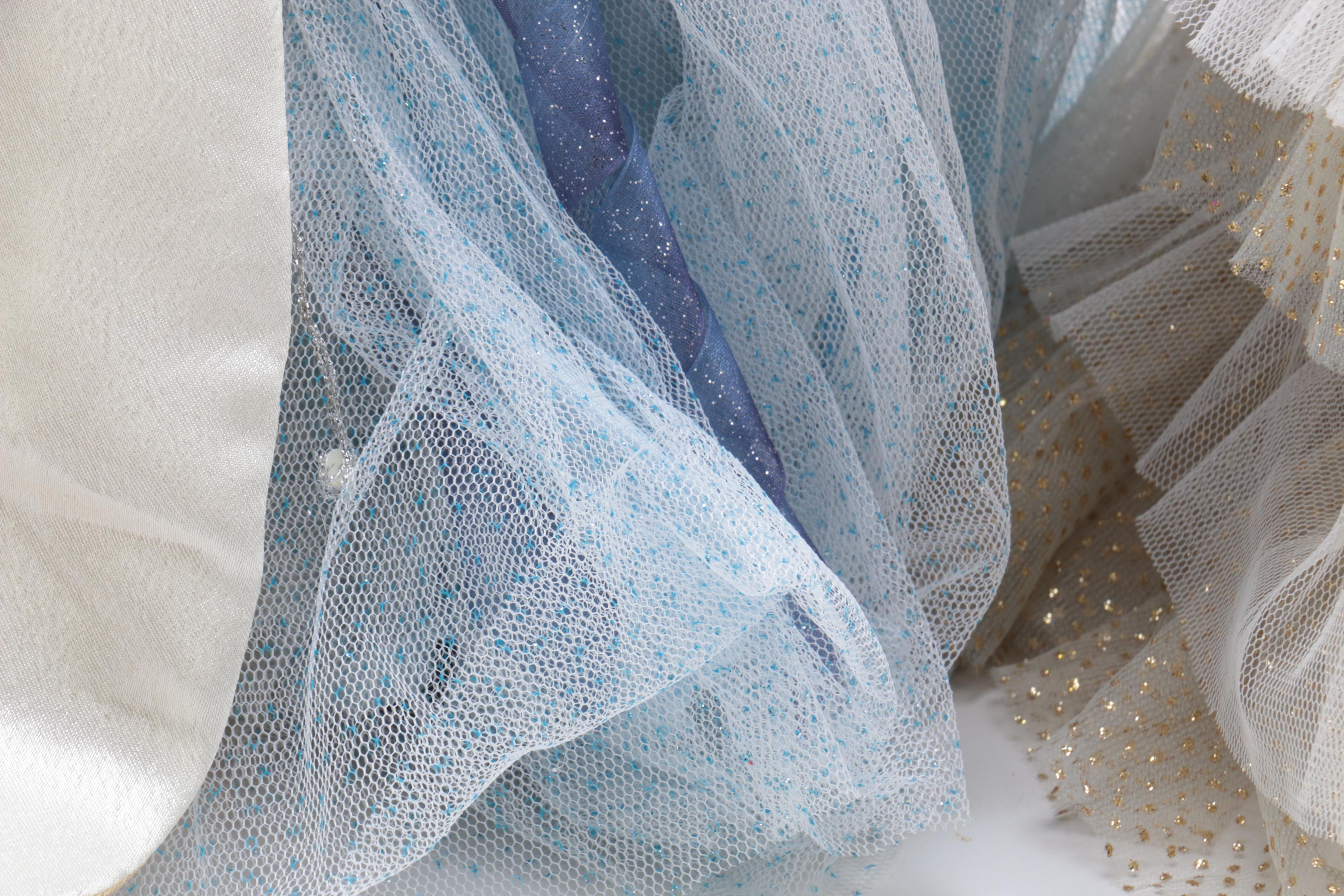 Collection of Three Porcelain Dolls