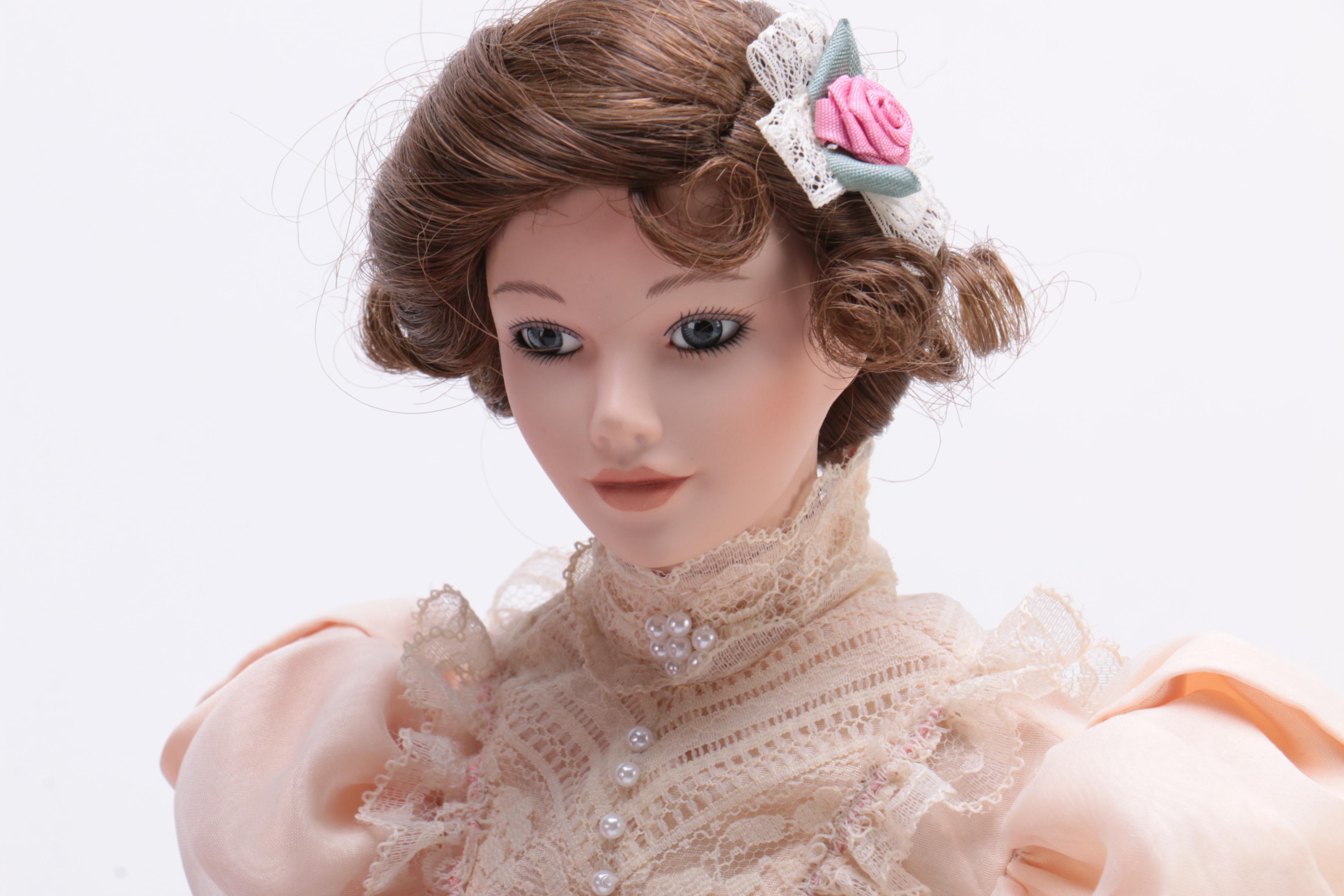 Two Ashton-Drake Porcelain Dolls