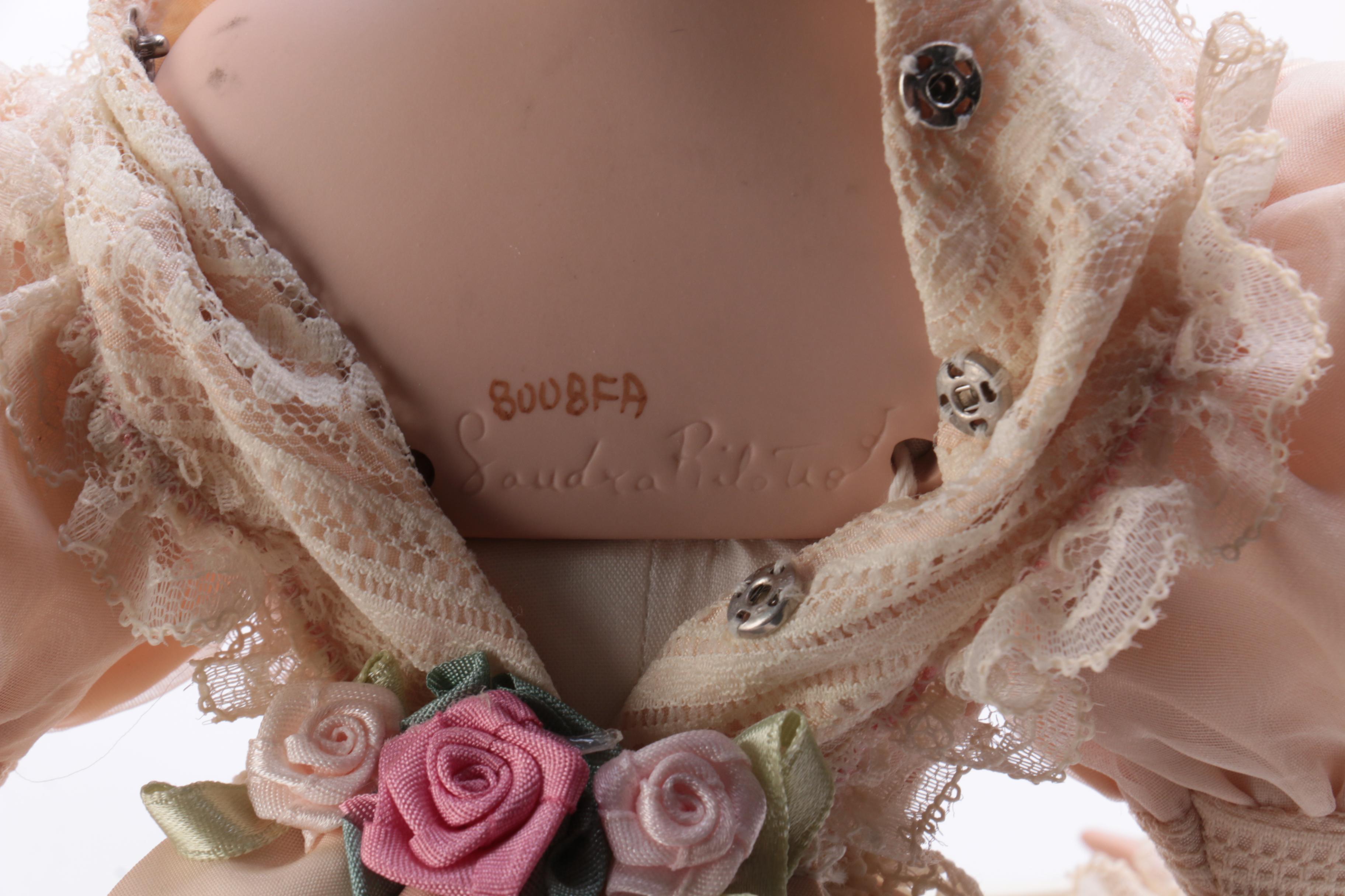 Two Ashton-Drake Porcelain Dolls