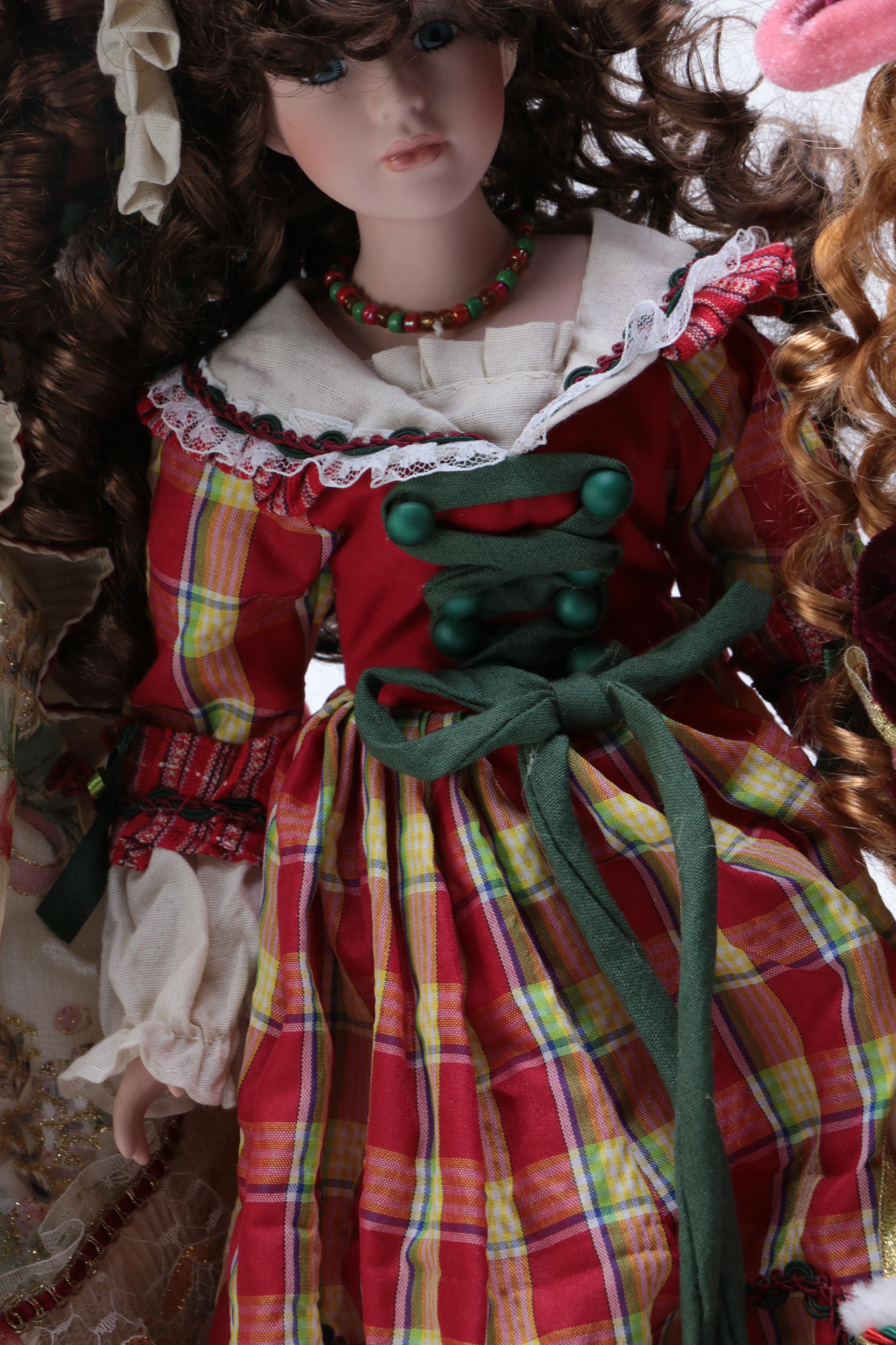 Collection of Four Porcelain Dolls