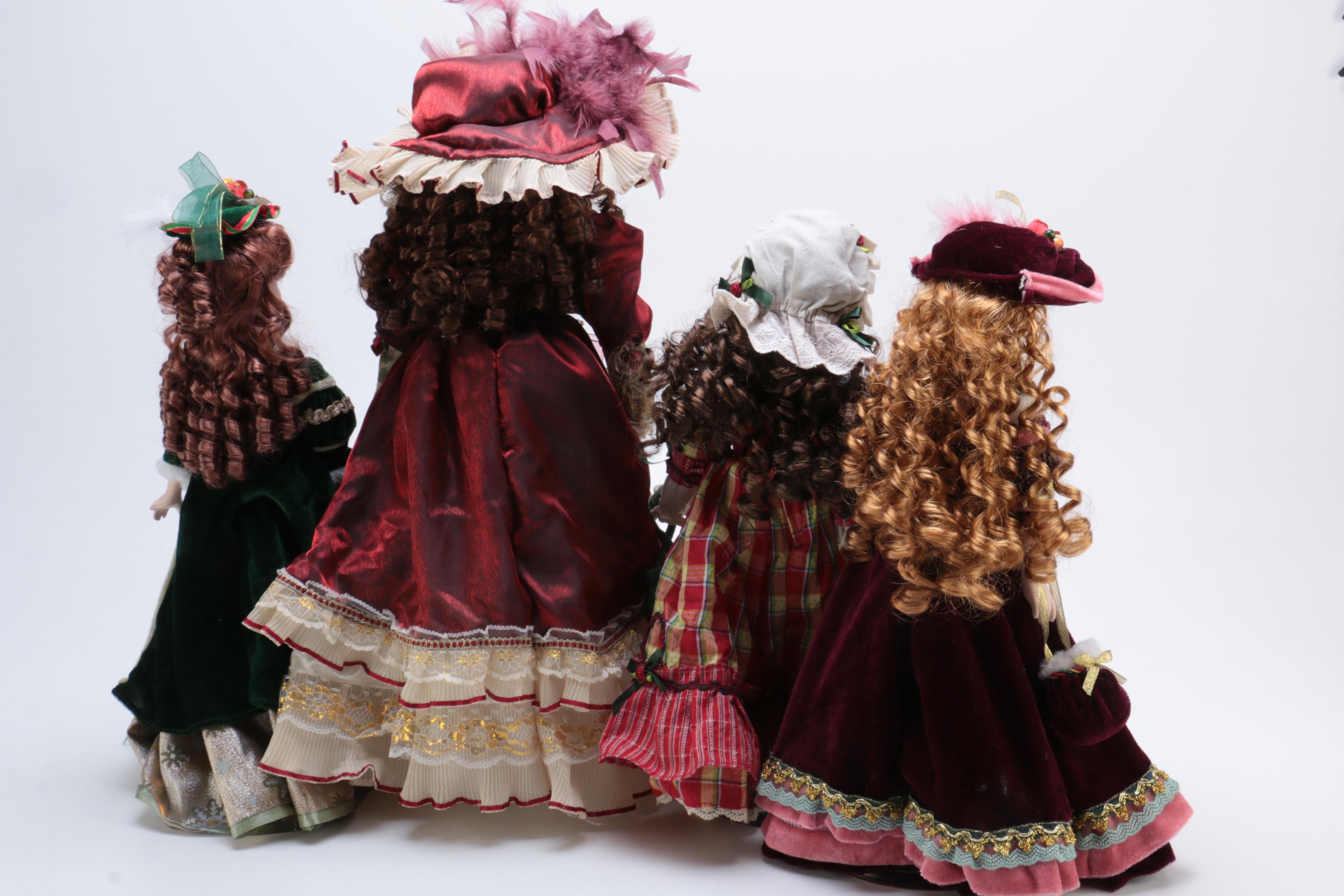 Collection of Four Porcelain Dolls