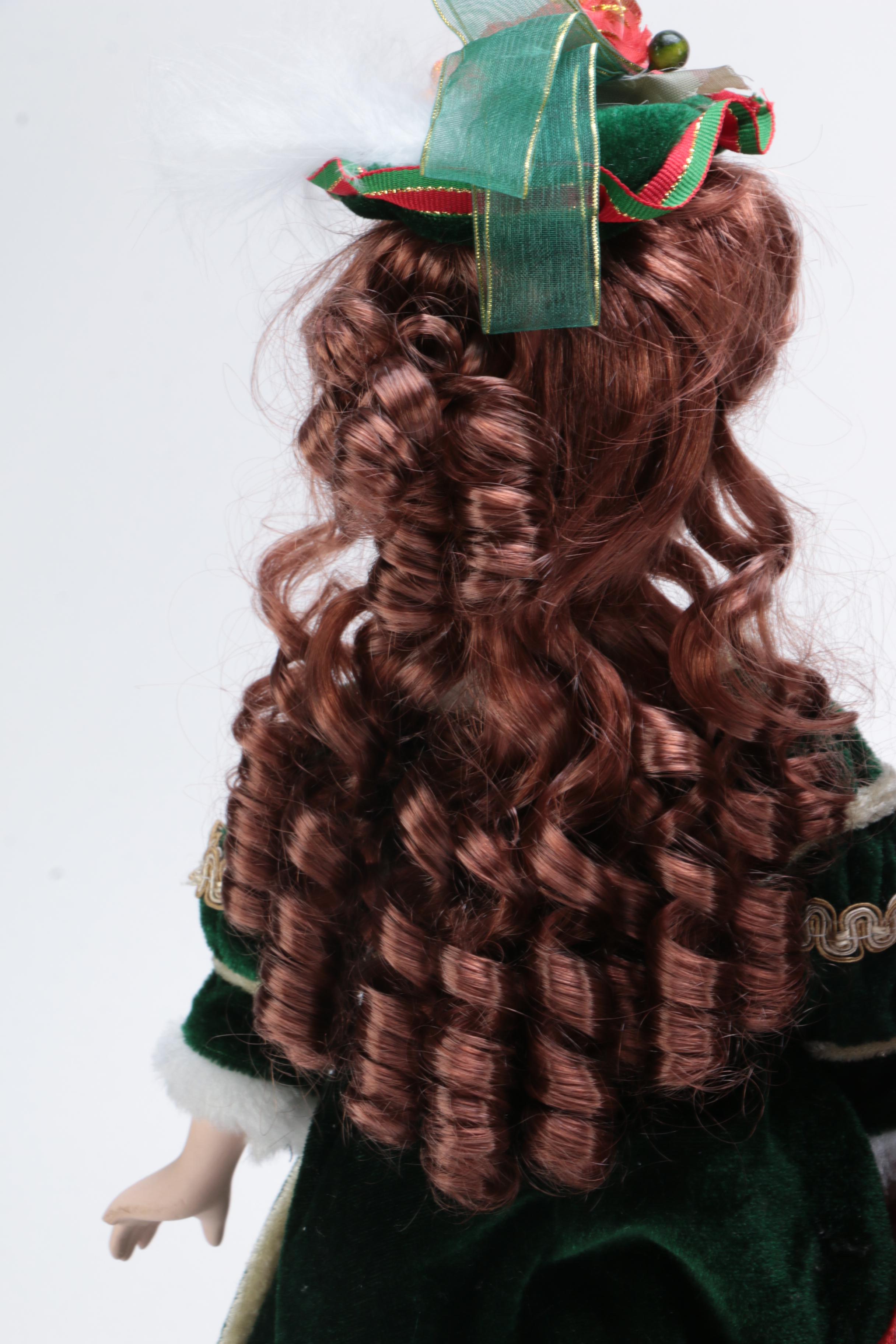 Collection of Four Porcelain Dolls