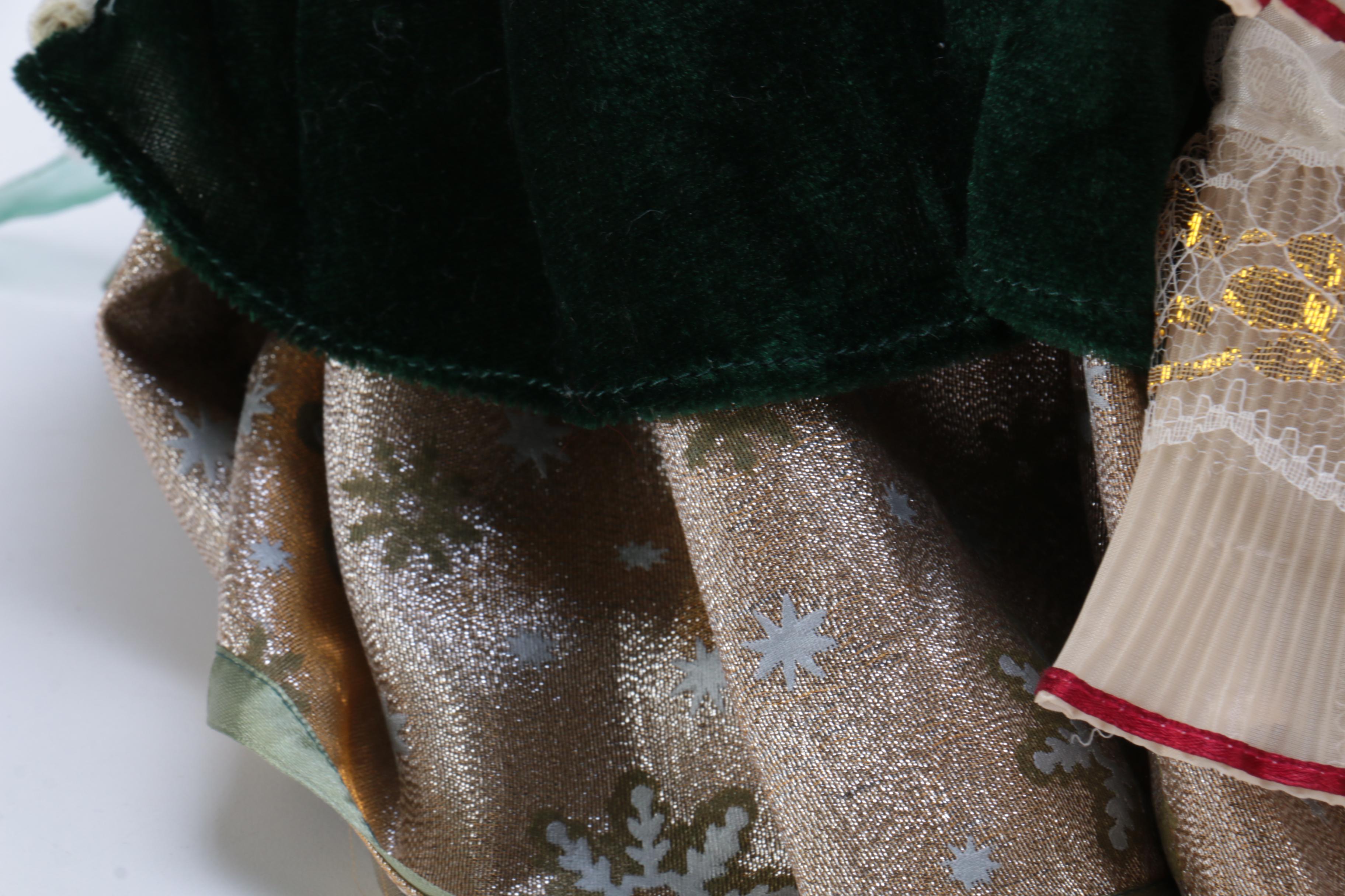Collection of Four Porcelain Dolls