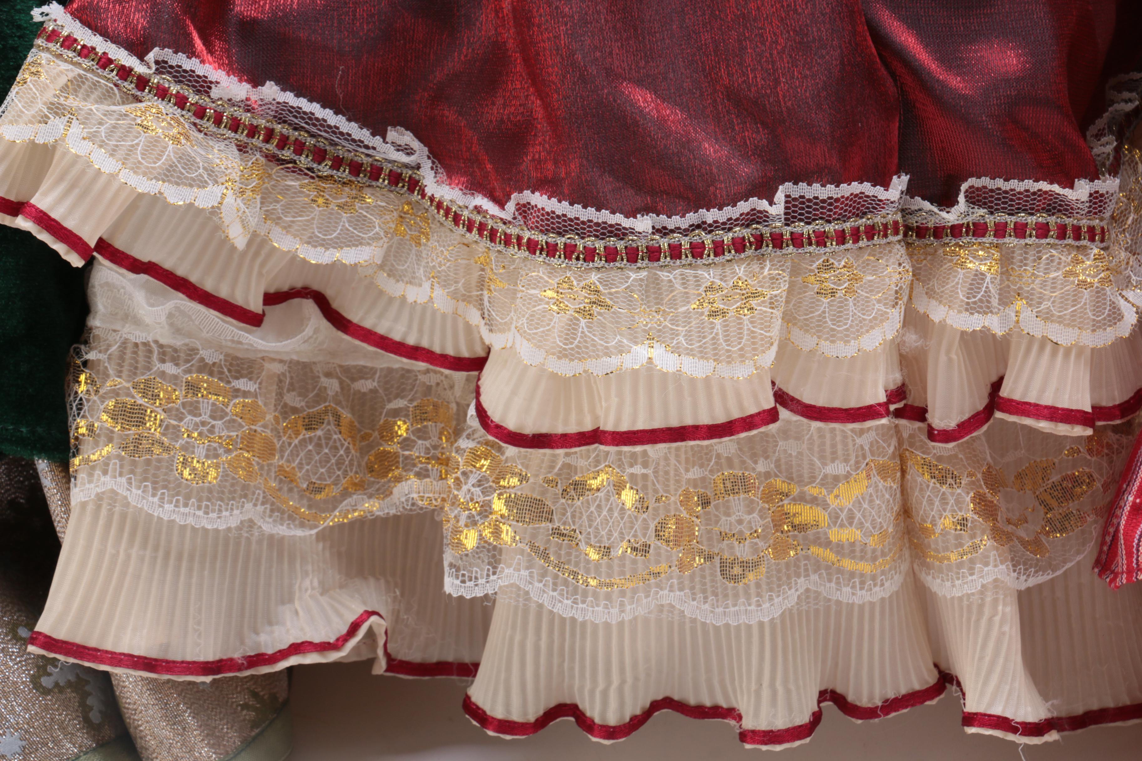 Collection of Four Porcelain Dolls