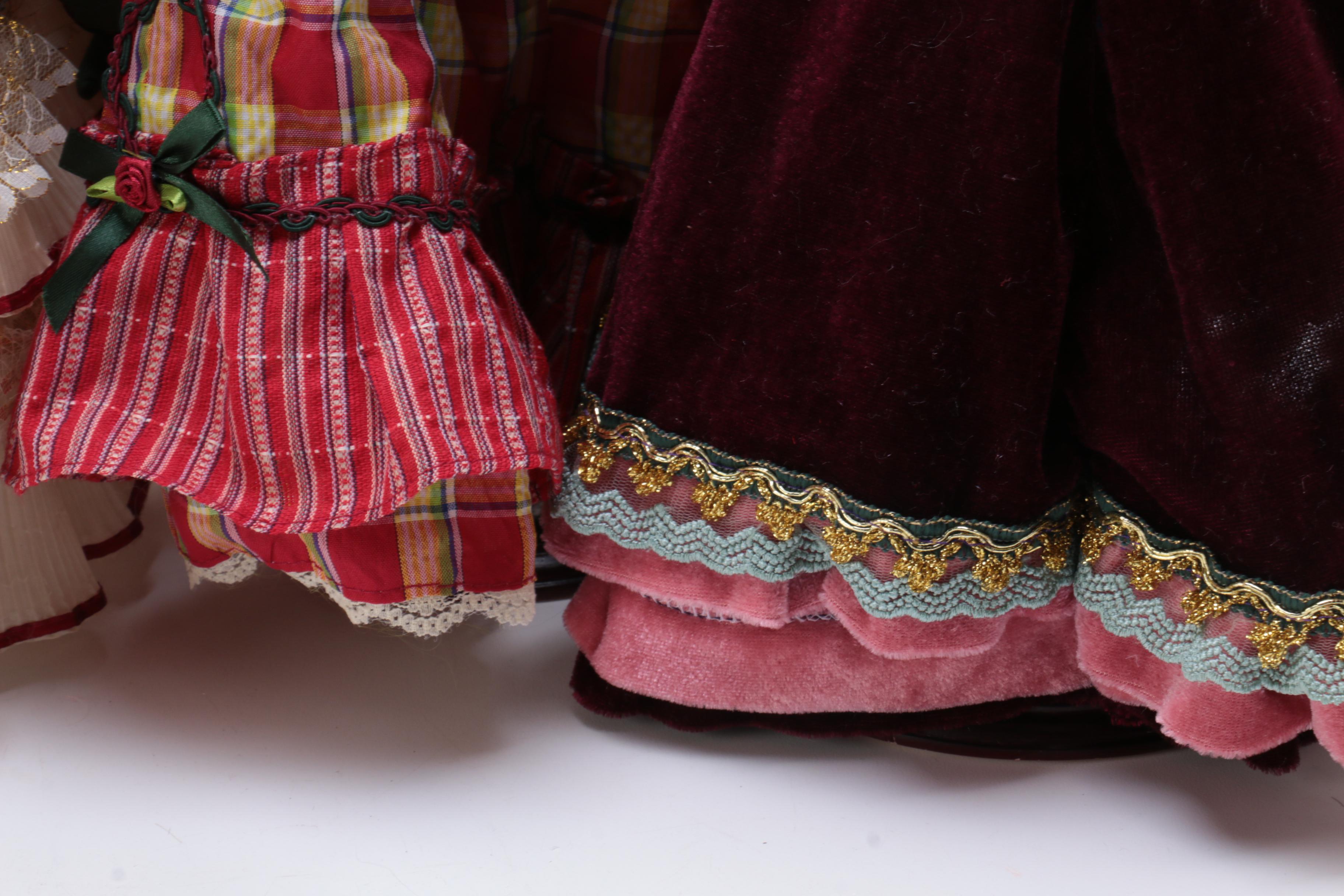 Collection of Four Porcelain Dolls