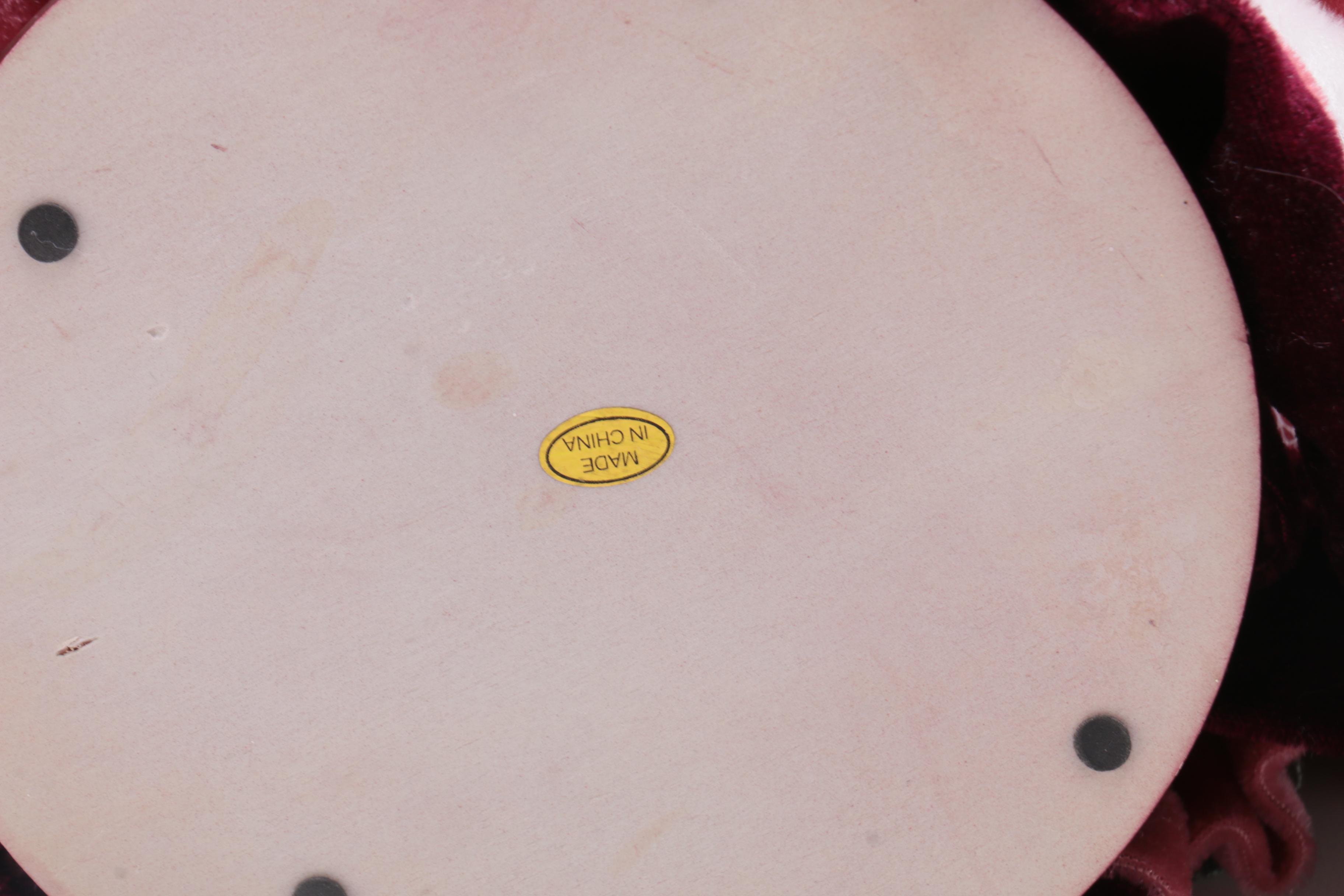 Collection of Four Porcelain Dolls