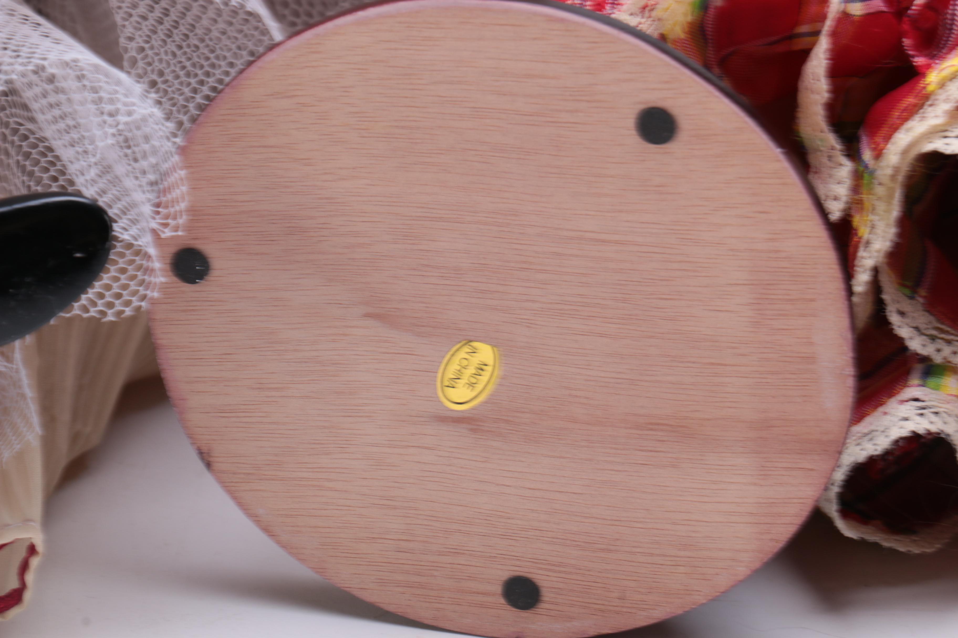 Collection of Four Porcelain Dolls