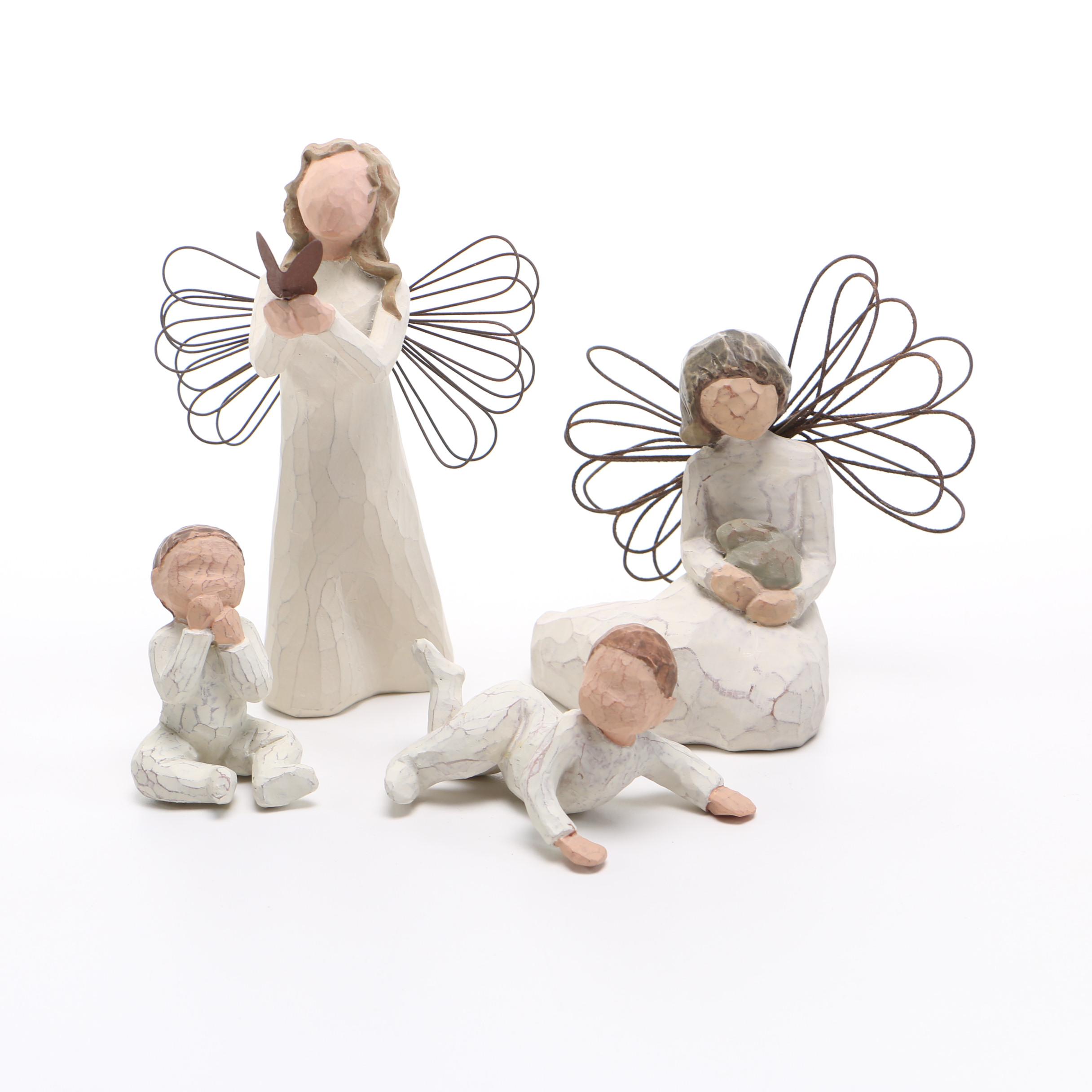 Collection of Willow Tree Wood Carved Figurines