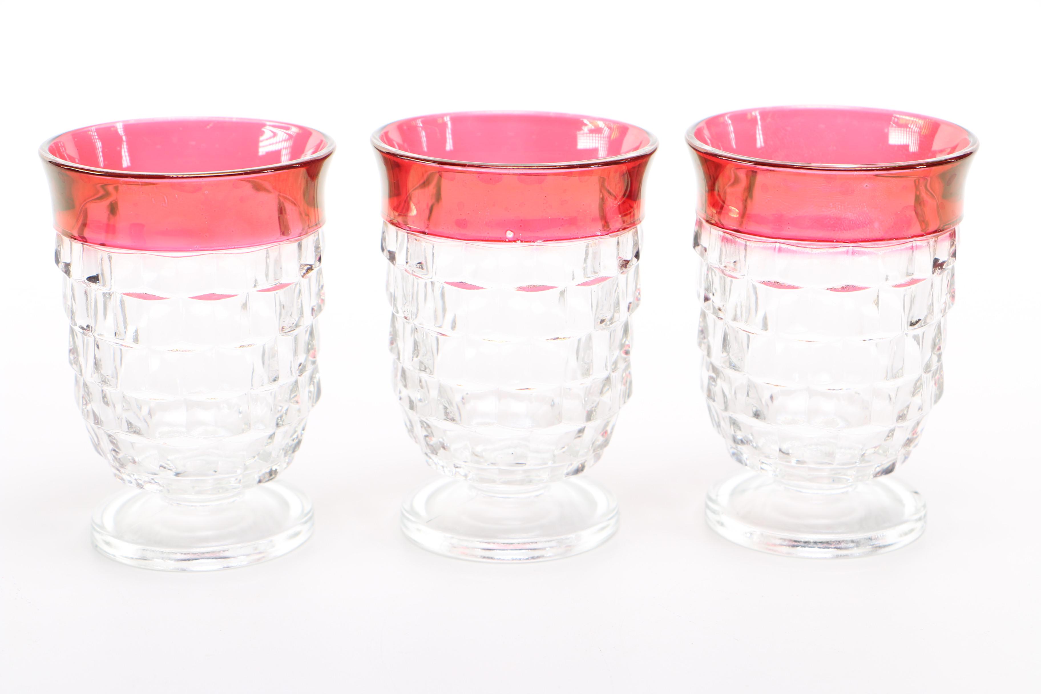 Ruby Flash Brandy Tumblers with Pressed Red Glass Candlesticks