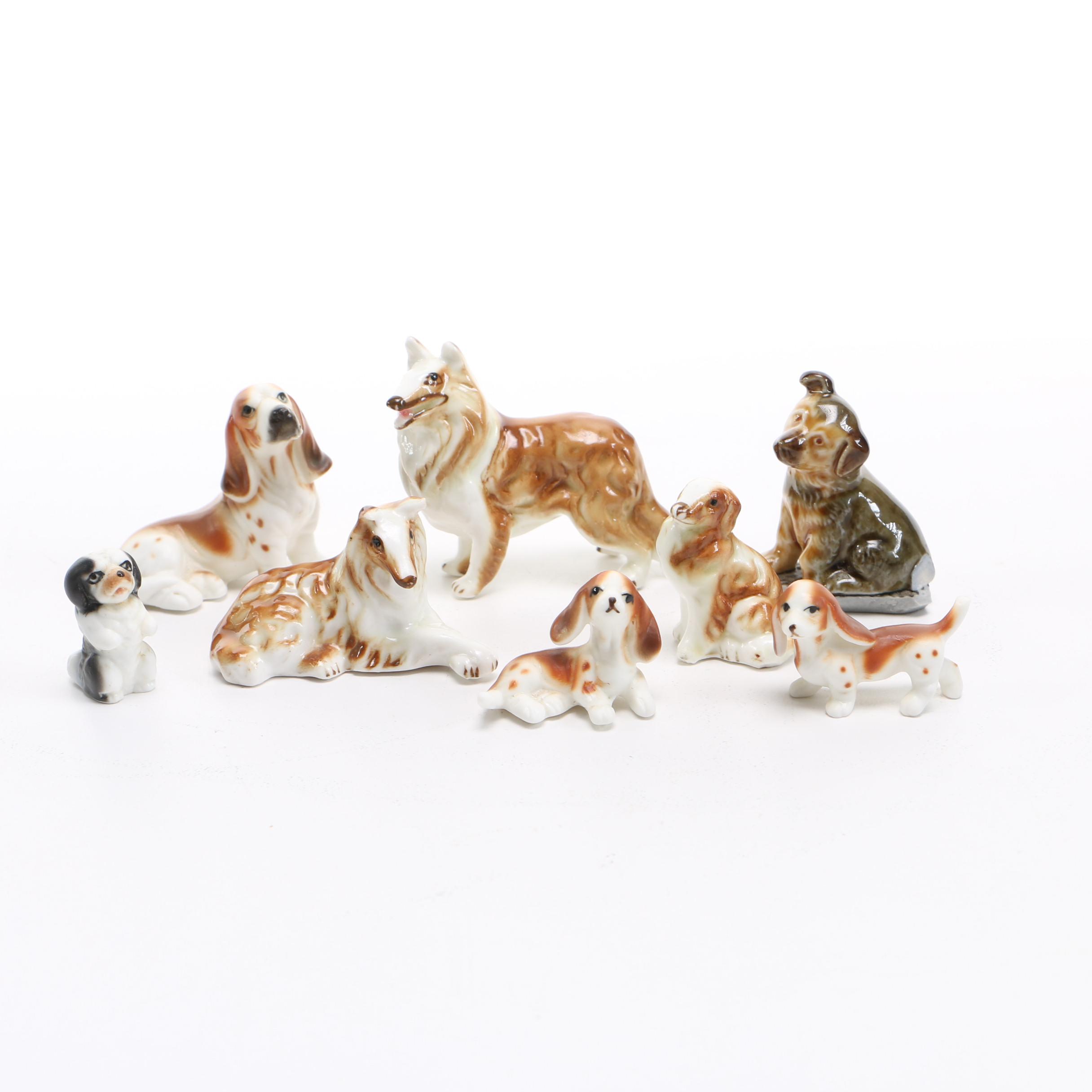 Assortment of Eight Vintage Ceramic Miniature Dog Figurines