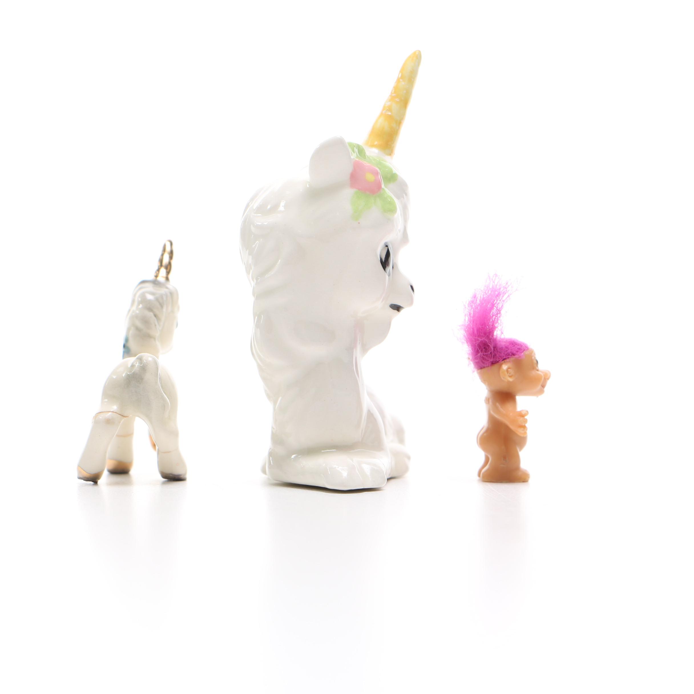 Assortment of Plastic and Ceramic Figures