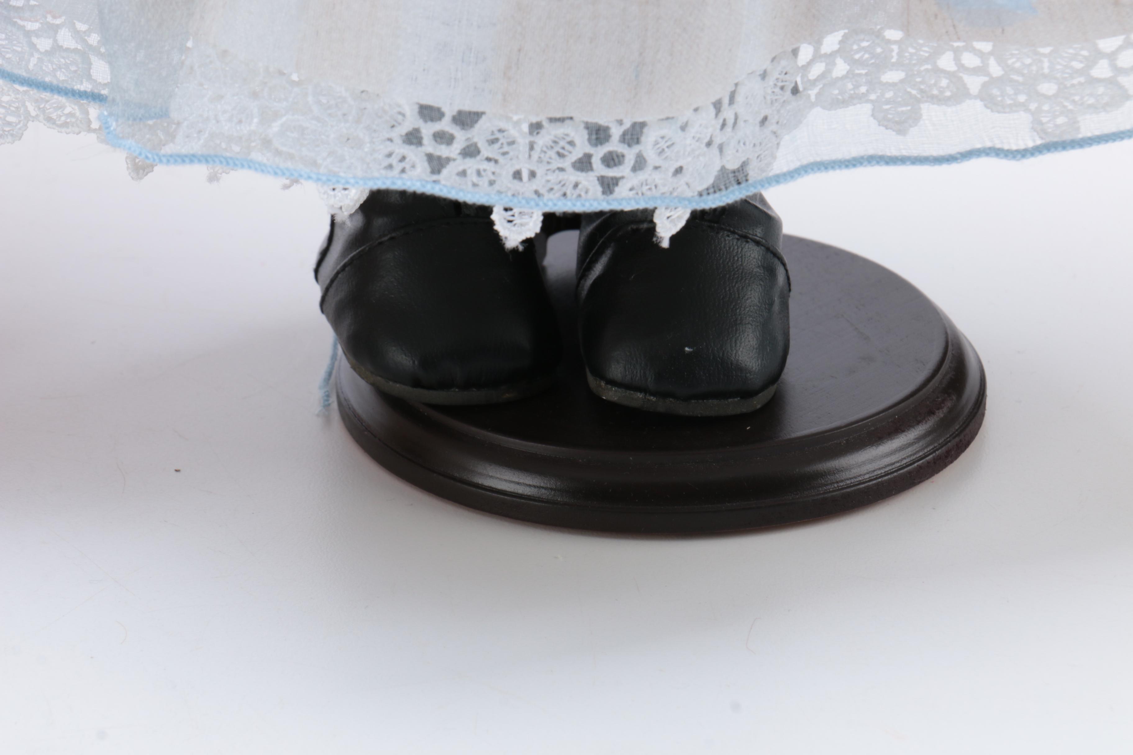 Youthful Porcelain Dolls with Stands