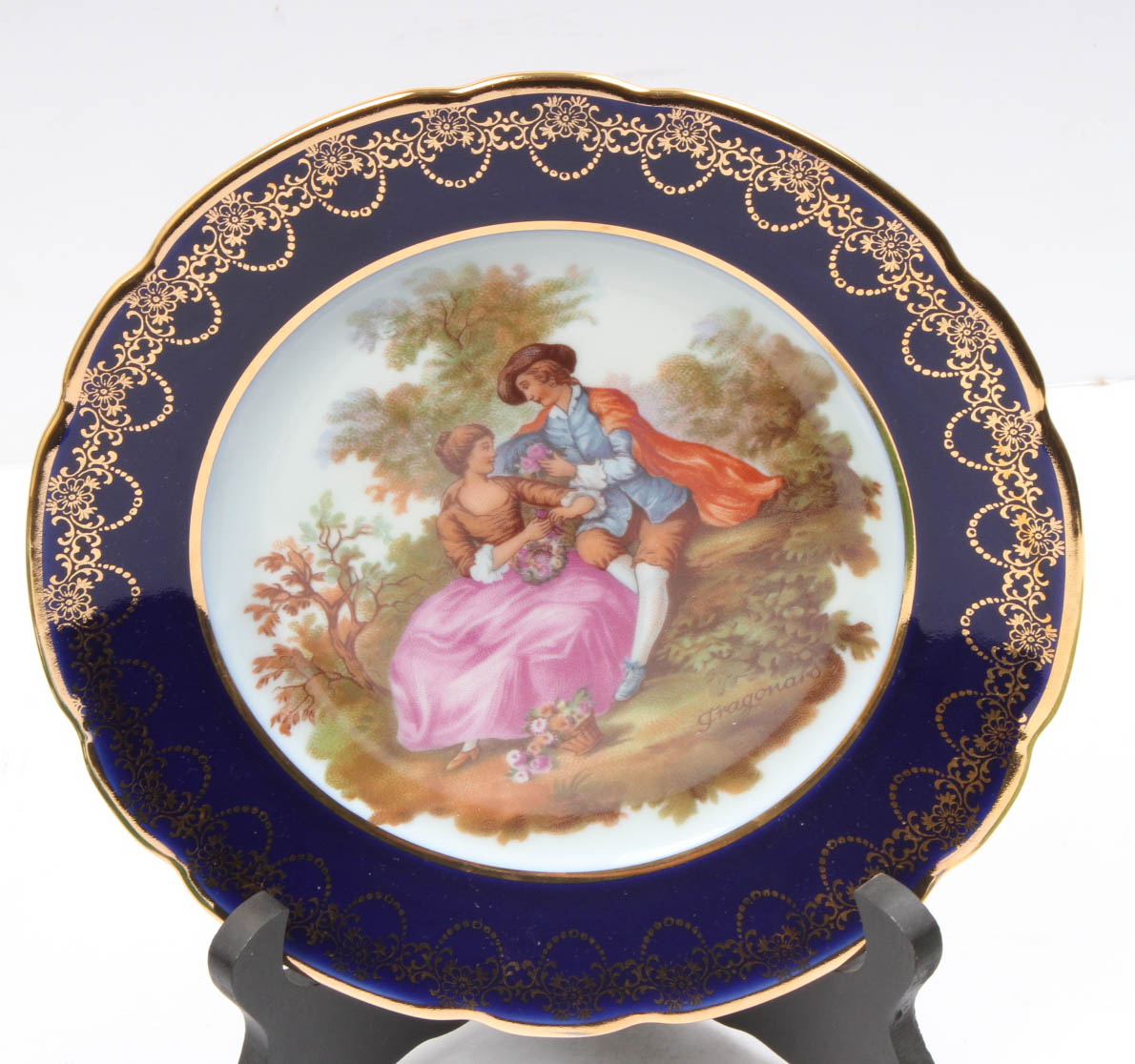 Ceramic Plates Featuring Limoges and Majolica