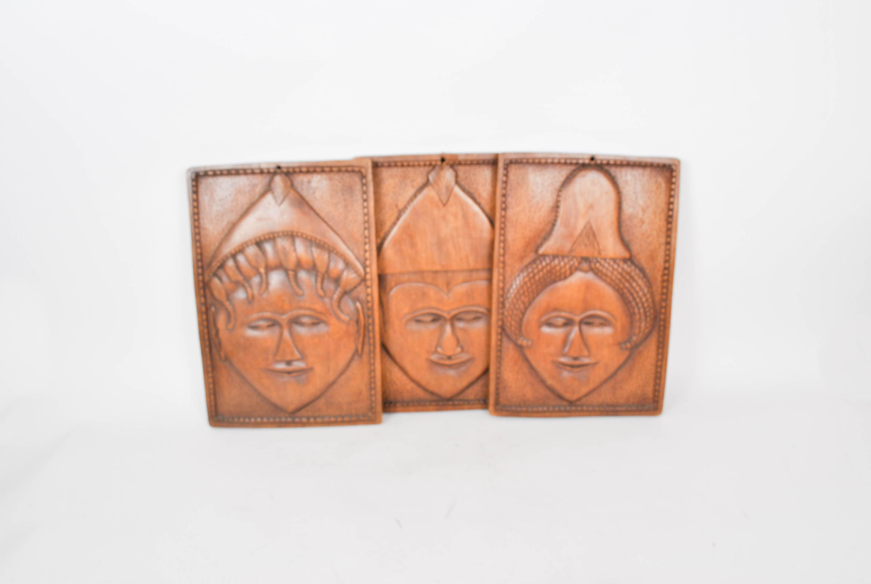 Three Carved Plaques