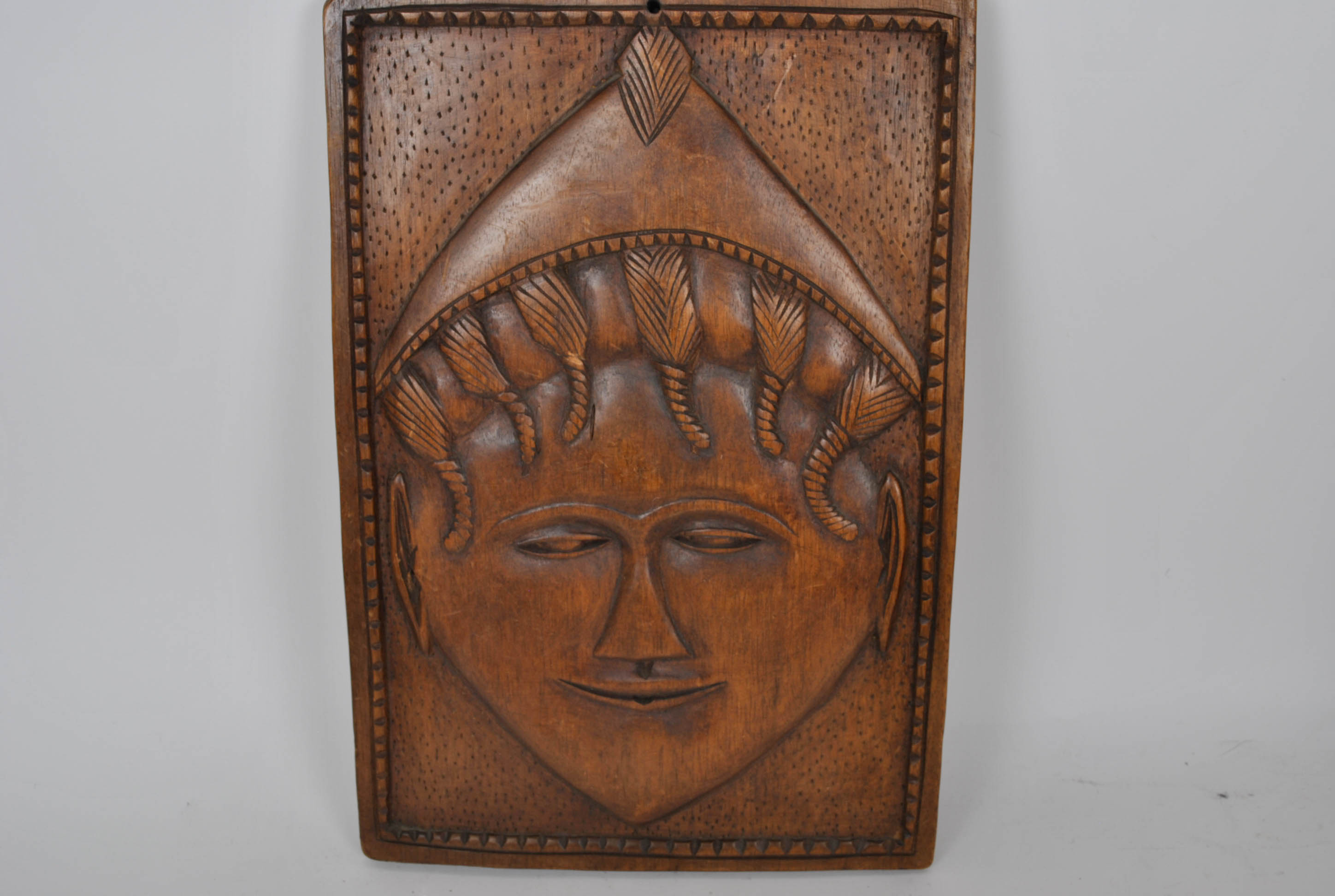 Three Carved Plaques