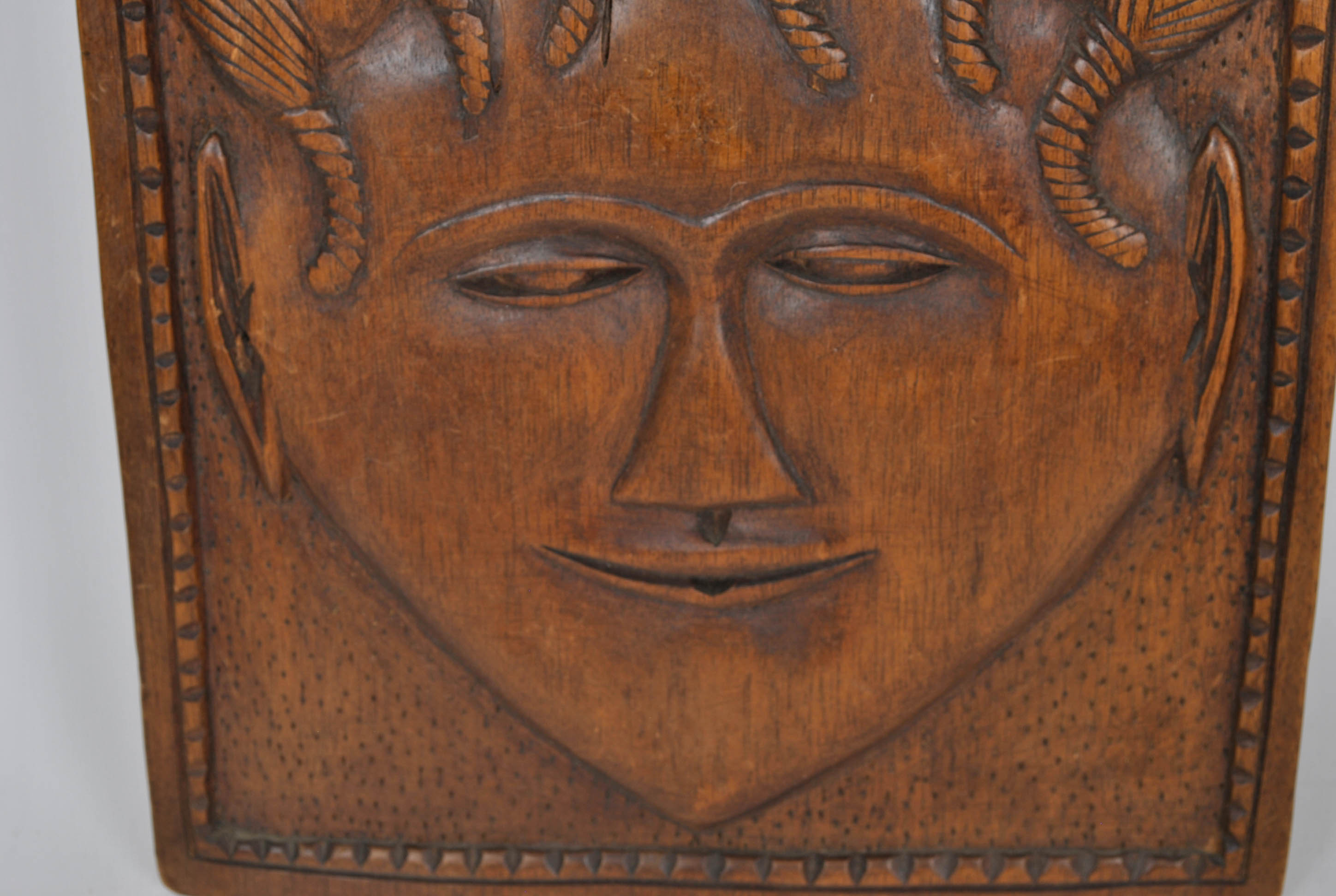 Three Carved Plaques