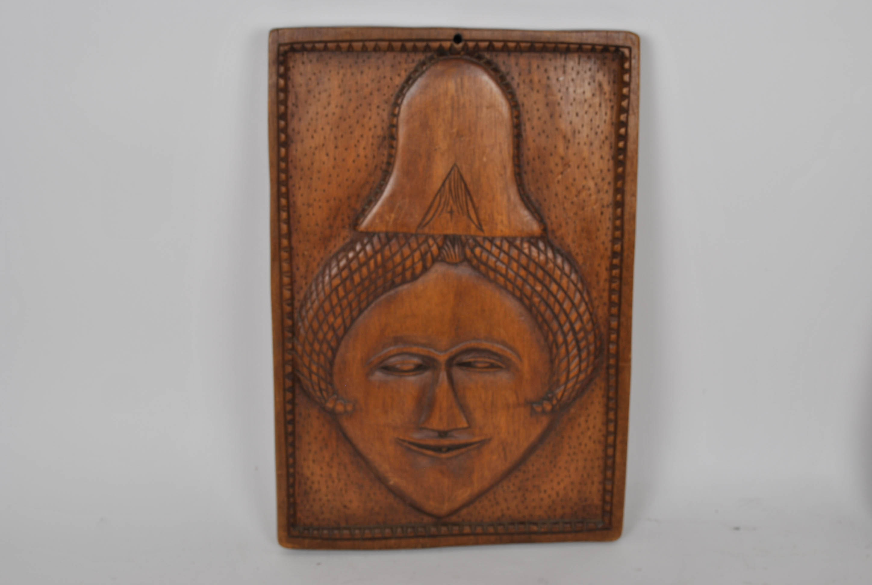 Three Carved Plaques