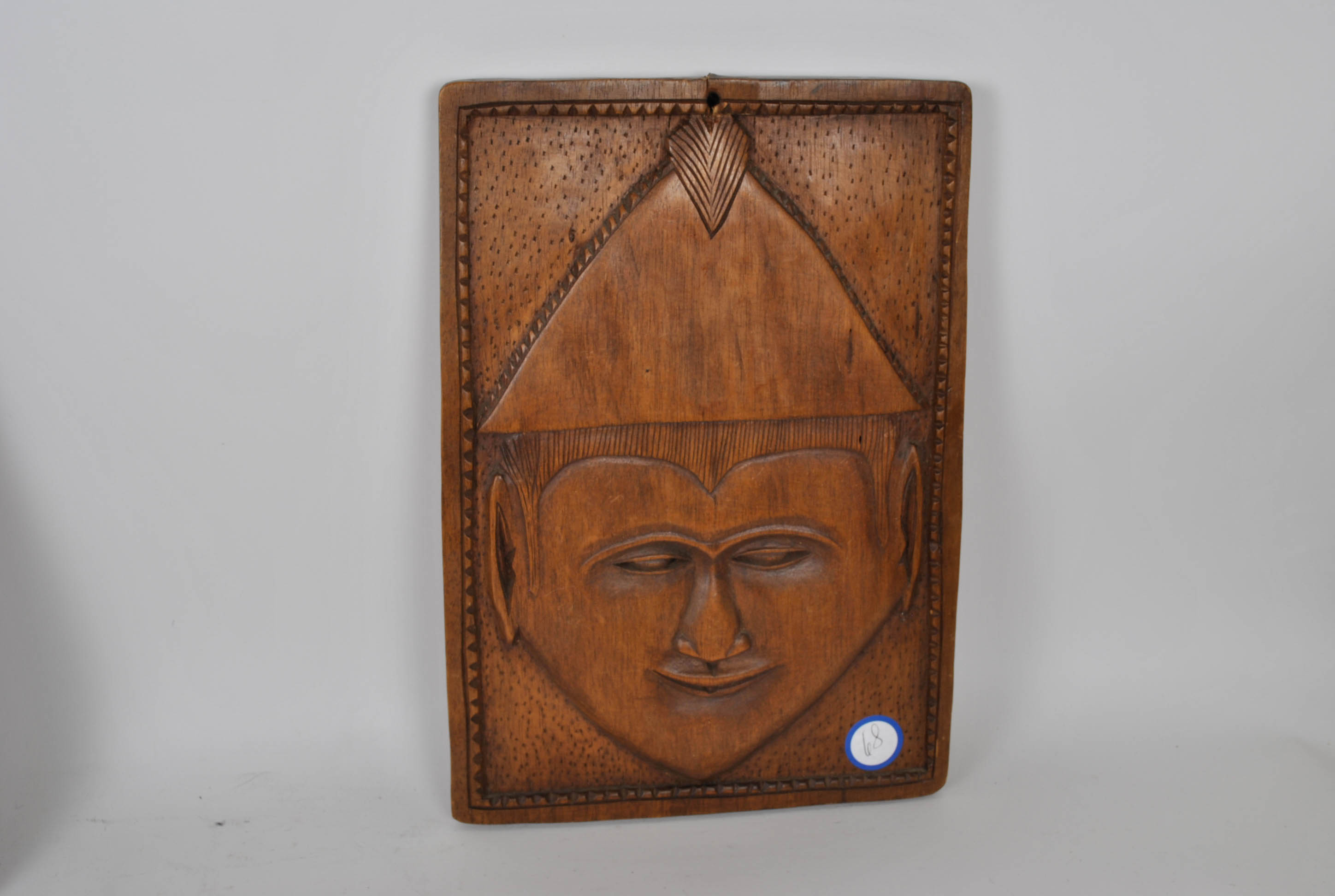 Three Carved Plaques