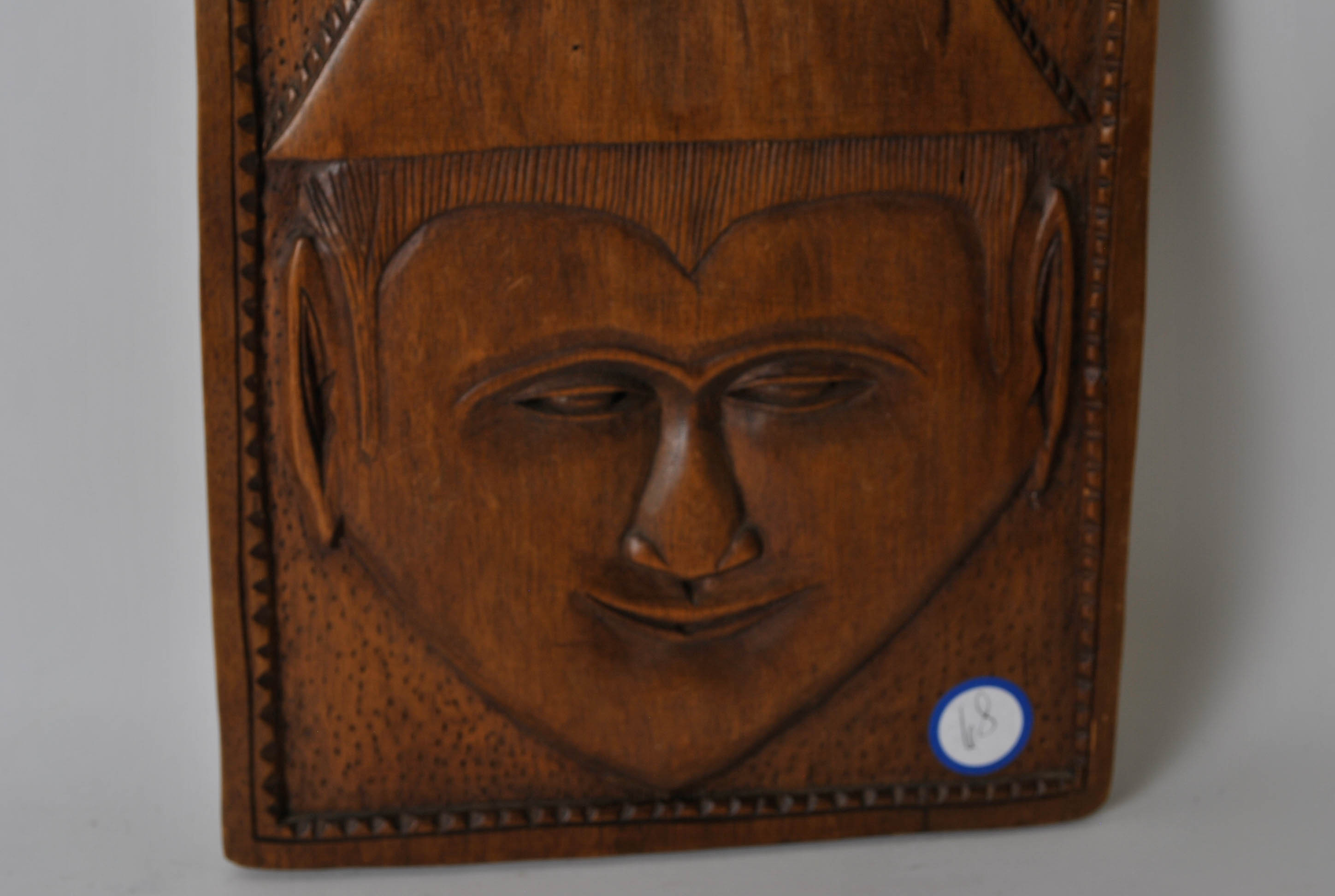 Three Carved Plaques