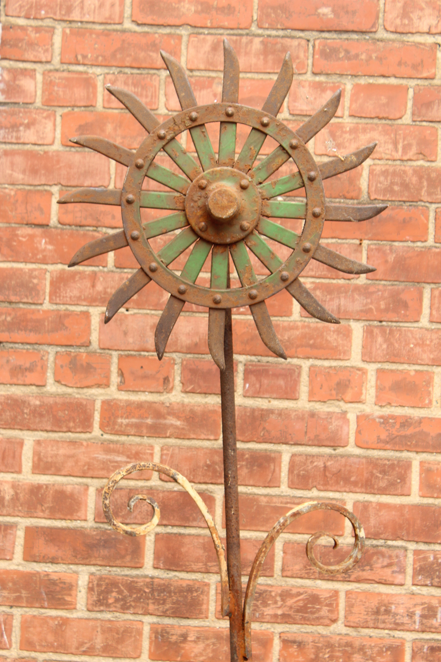 Lawn Ornaments Created from Antique Farm Equipment