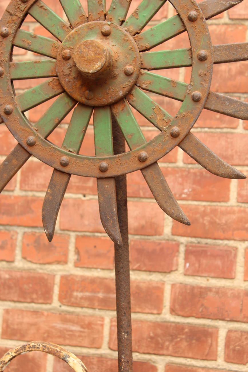 Lawn Ornaments Created from Antique Farm Equipment