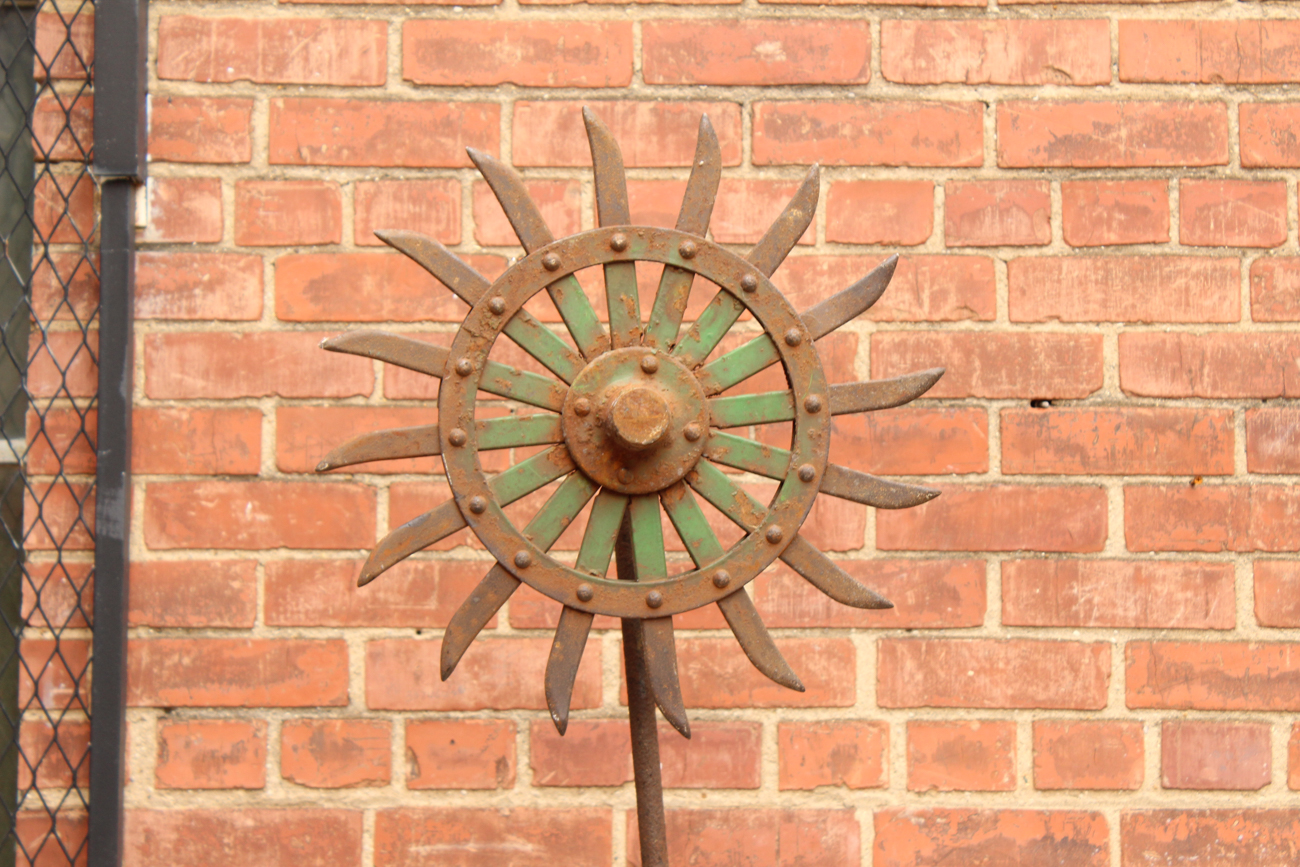 Lawn Ornaments Created from Antique Farm Equipment