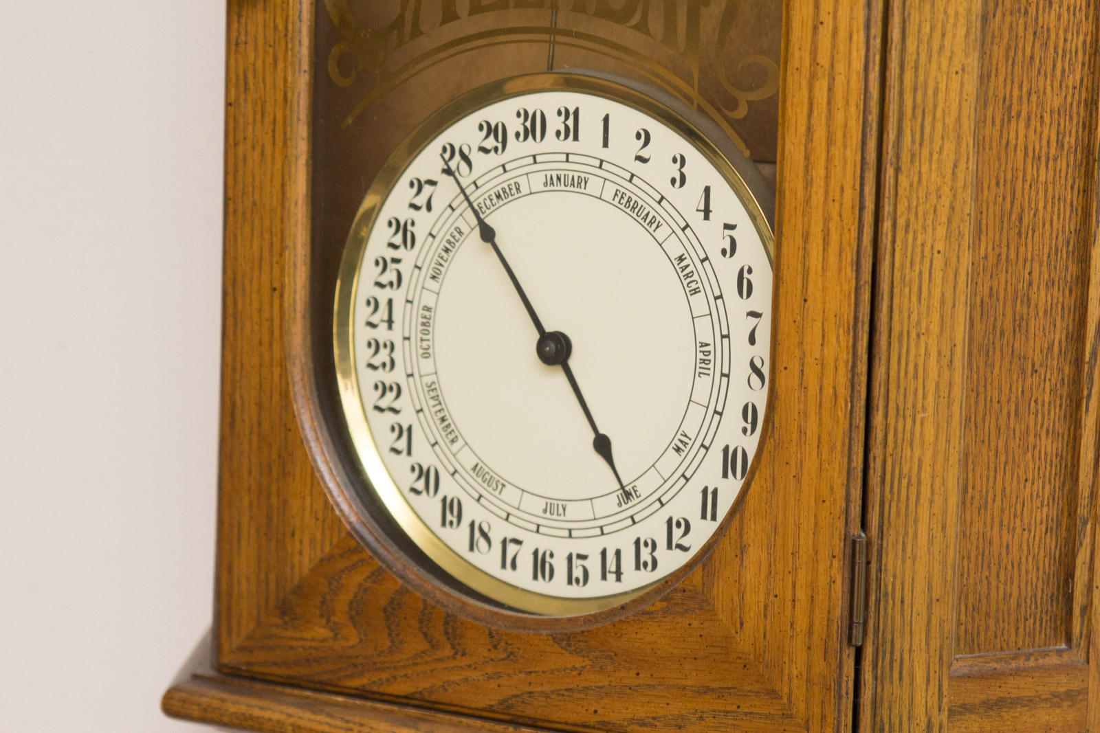 Howard Miller Calendar Wall Clock