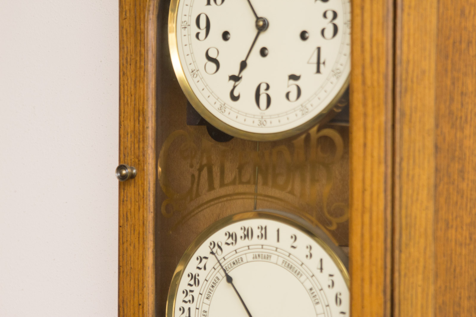 Howard Miller Calendar Wall Clock