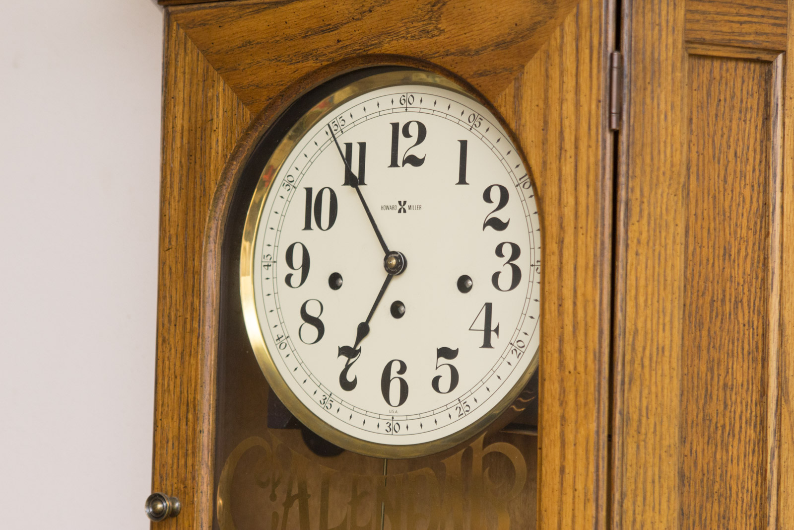 Howard Miller Calendar Wall Clock