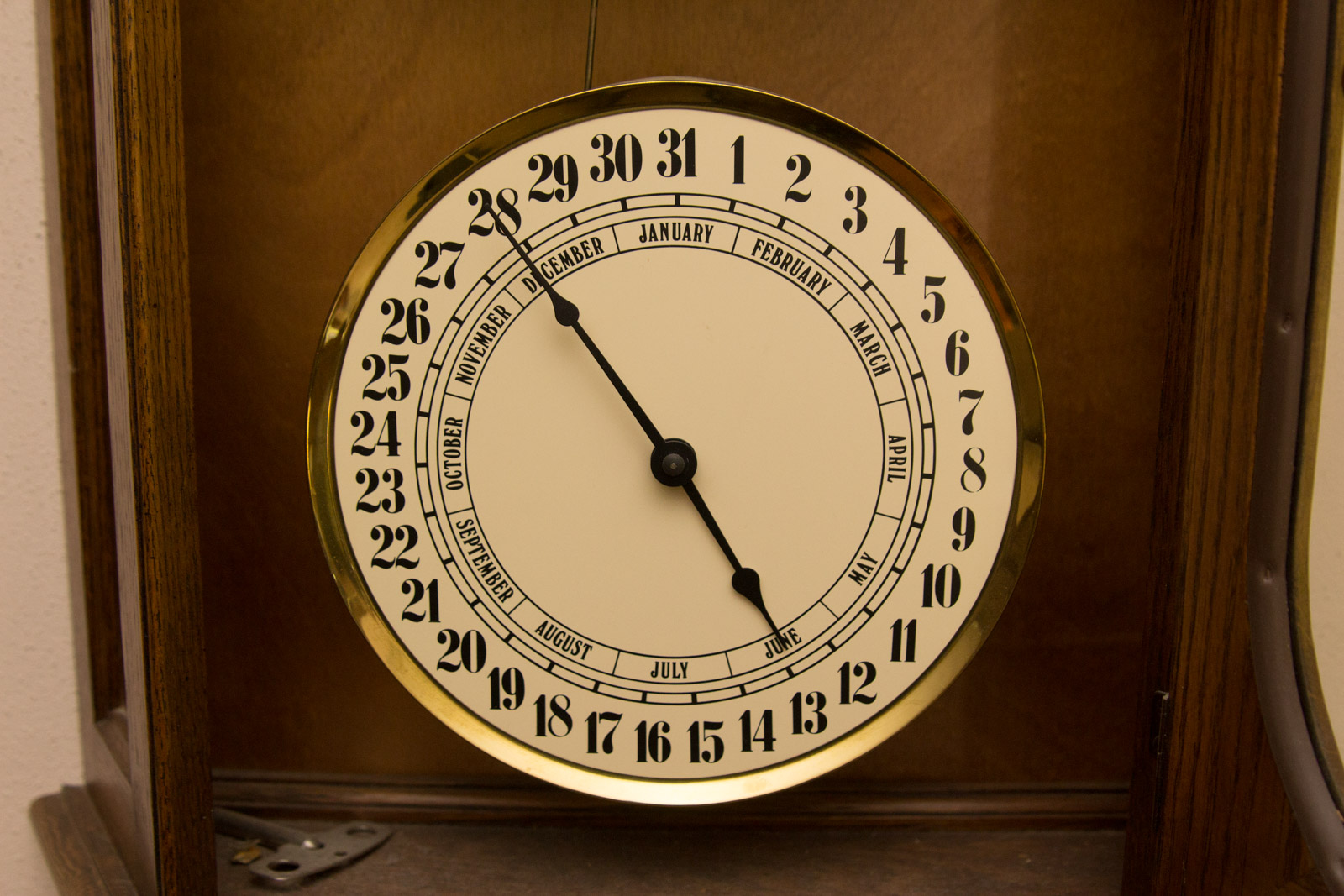 Howard Miller Calendar Wall Clock