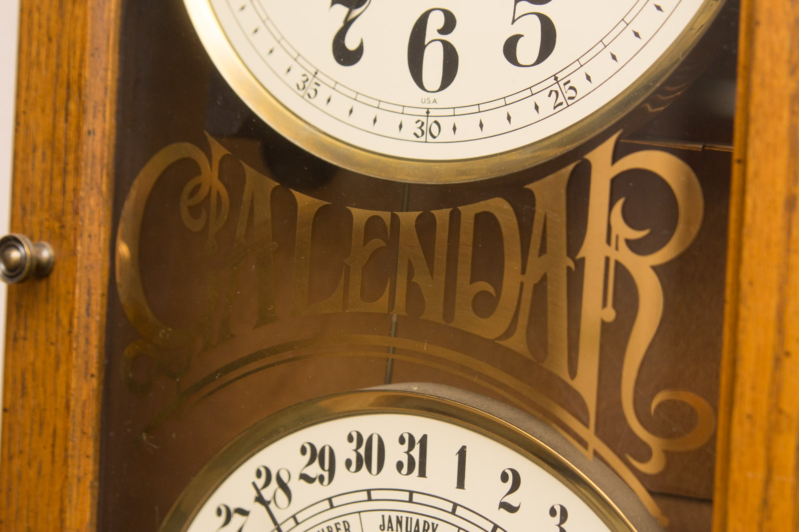 Howard Miller Calendar Wall Clock